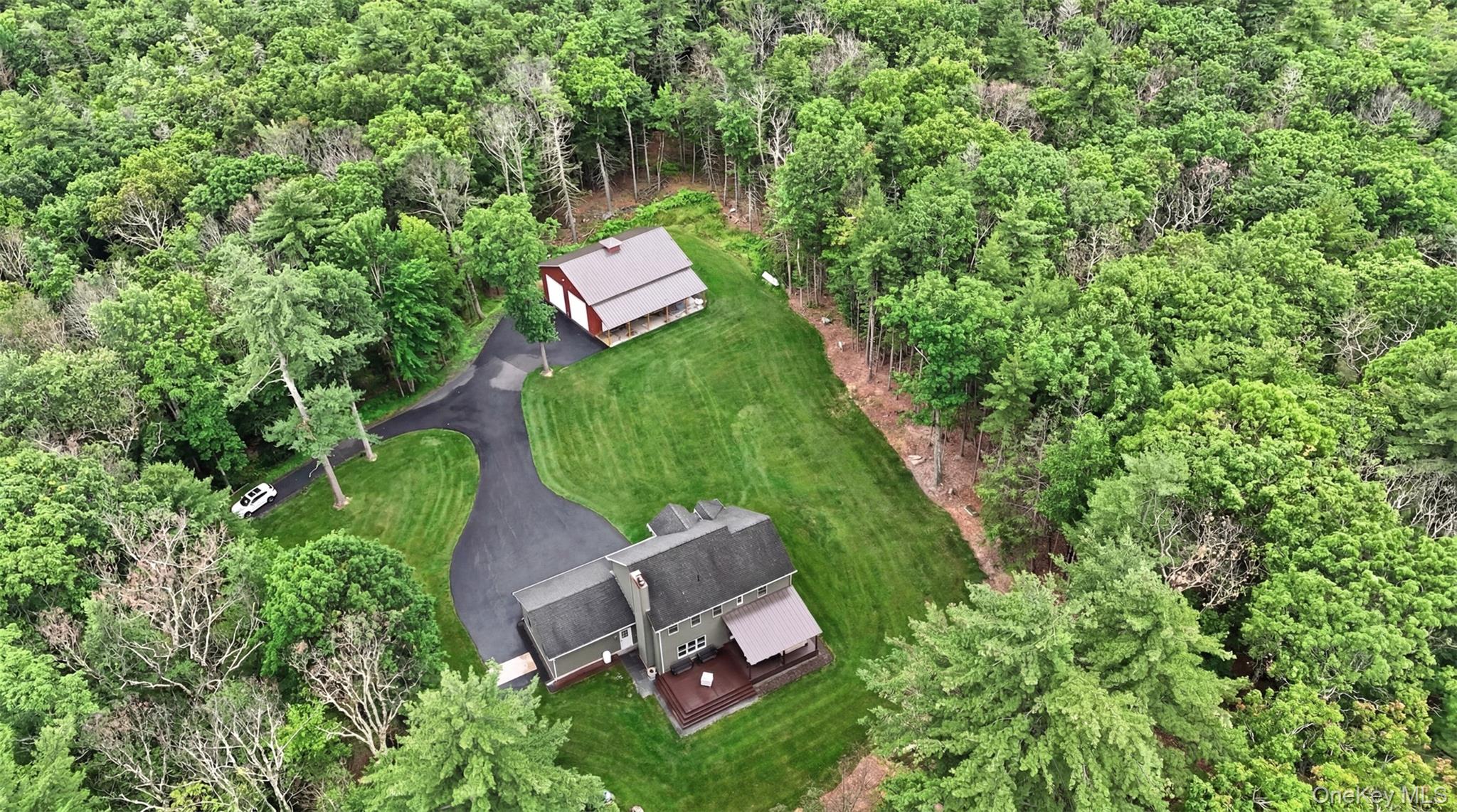 Secluded Colonial with Ample Garage