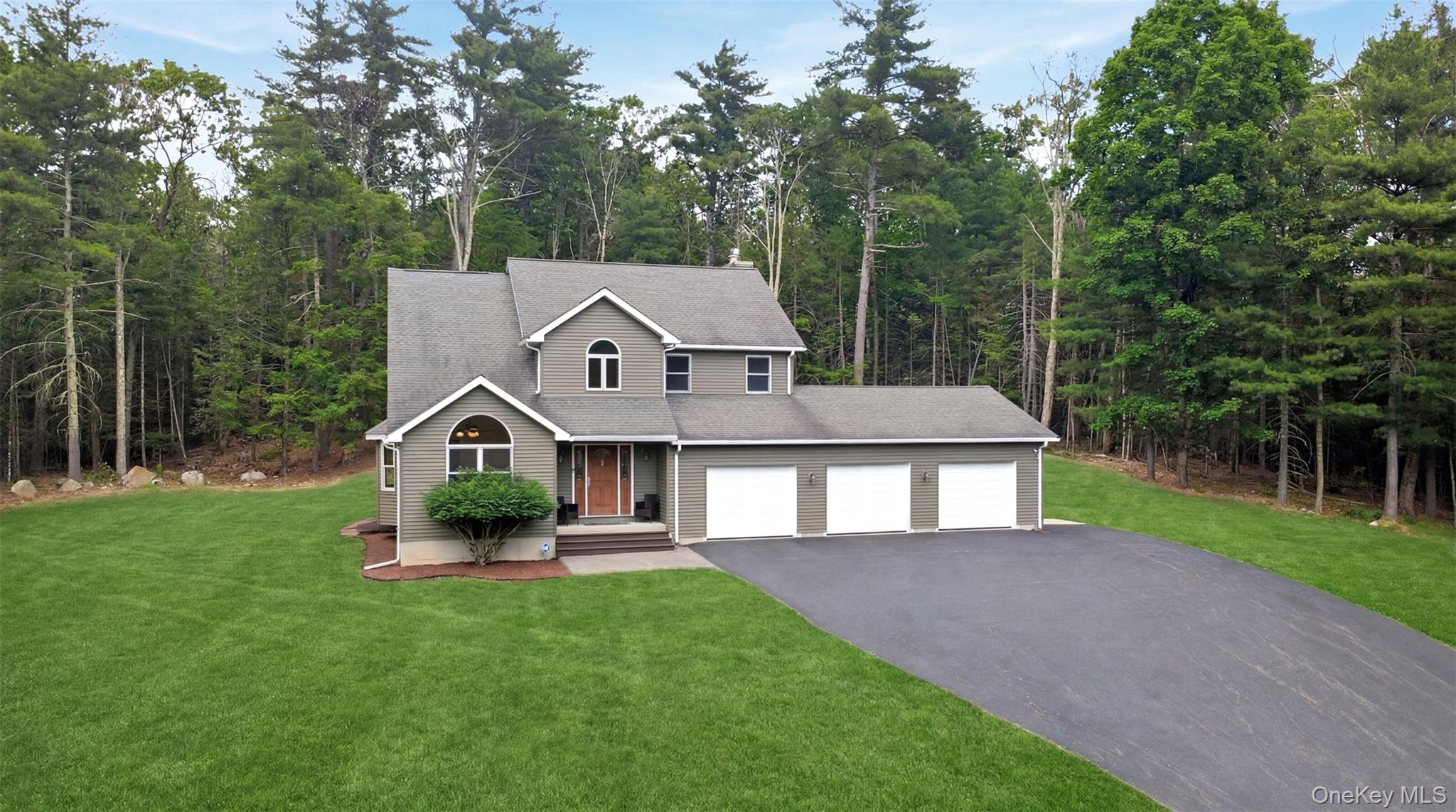 Secluded Colonial with Ample Garage