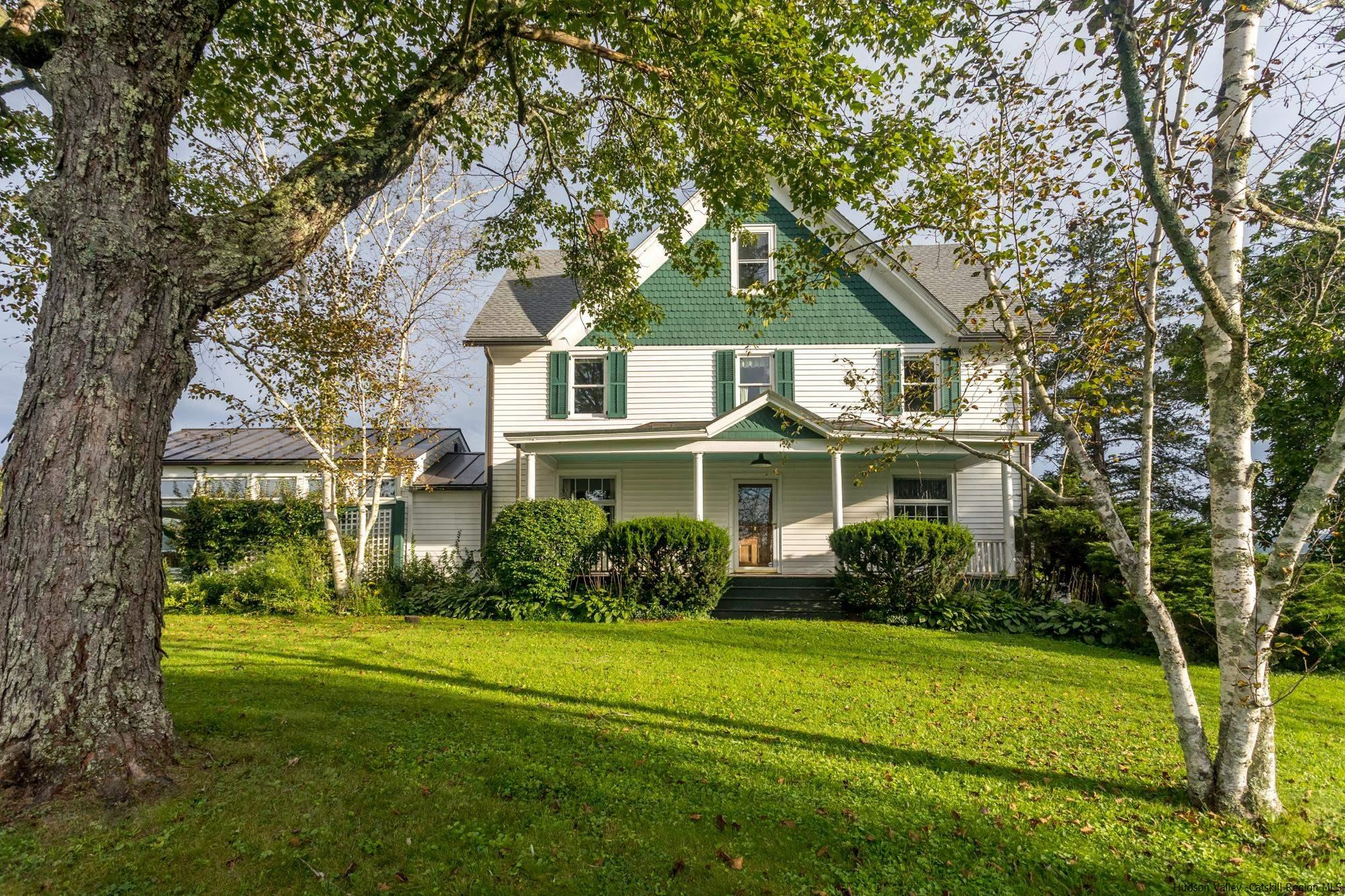 Stunning Farmstead on 100+ Acres