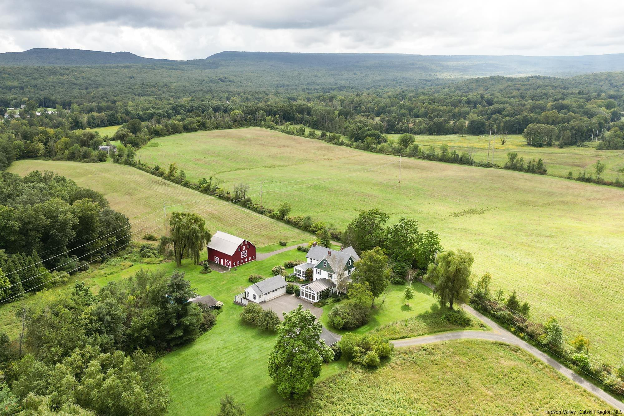 Stunning Farmstead on 100+ Acres