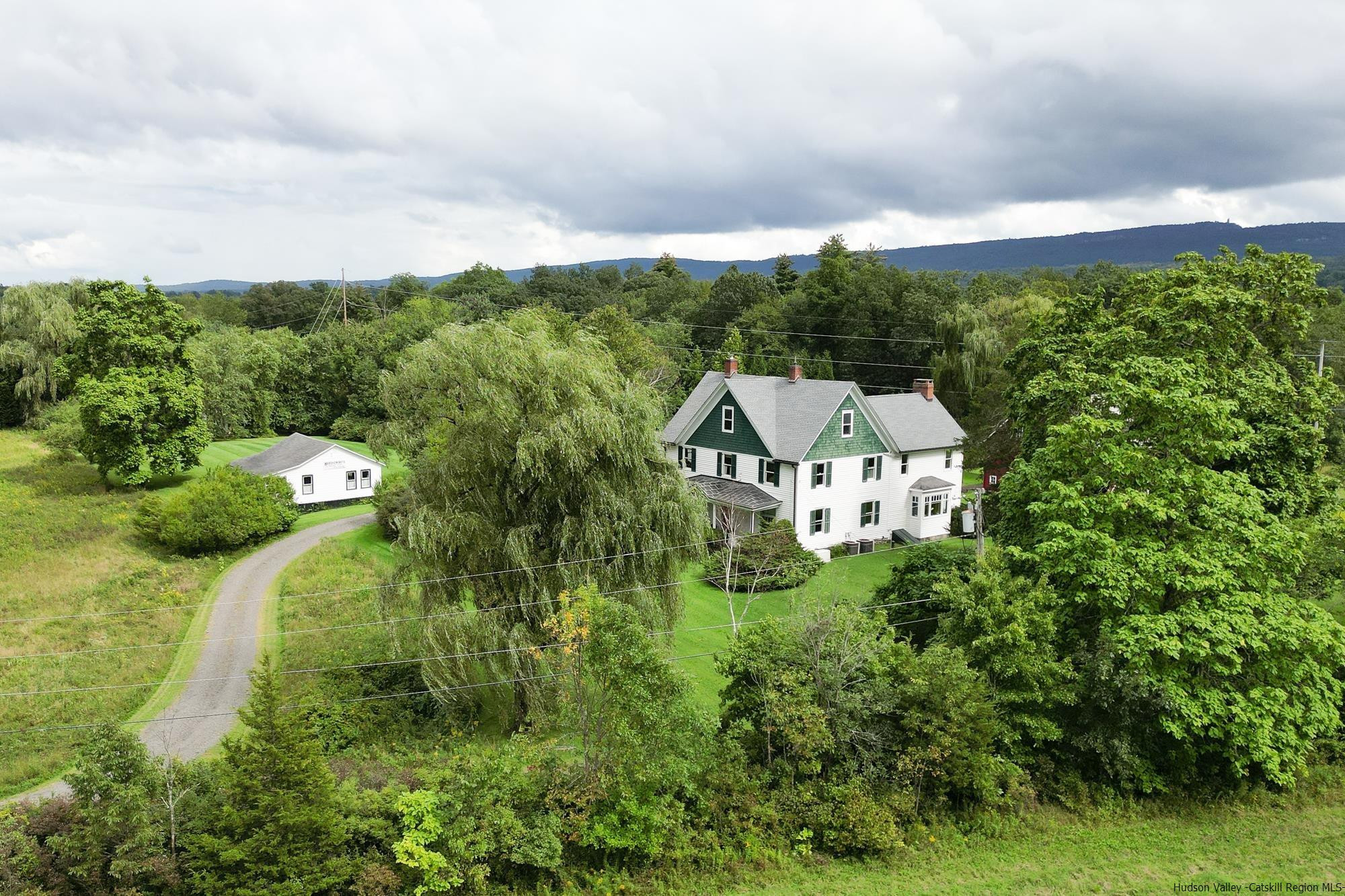 Stunning Farmstead on 100+ Acres