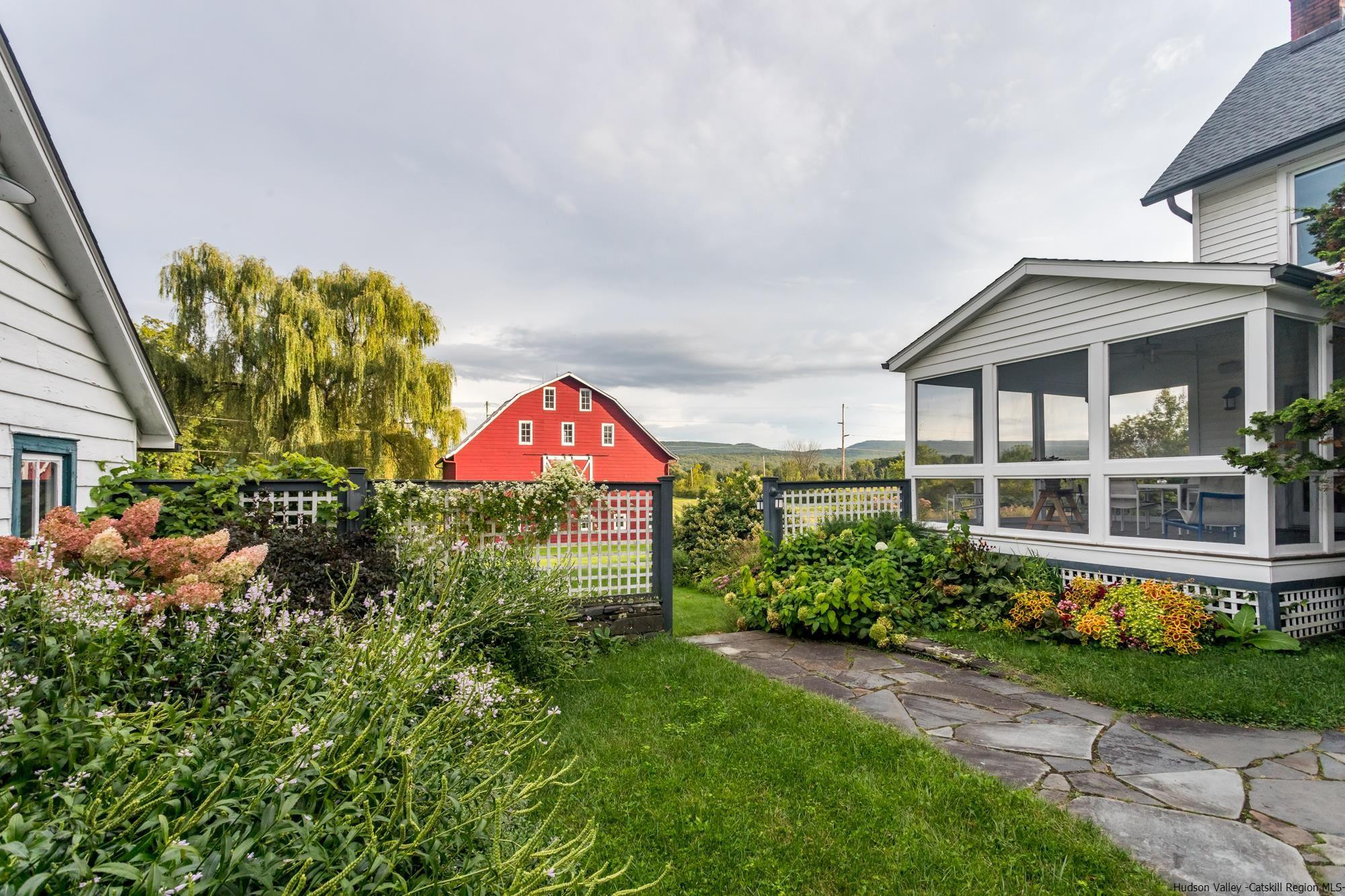 Stunning Farmstead on 100+ Acres