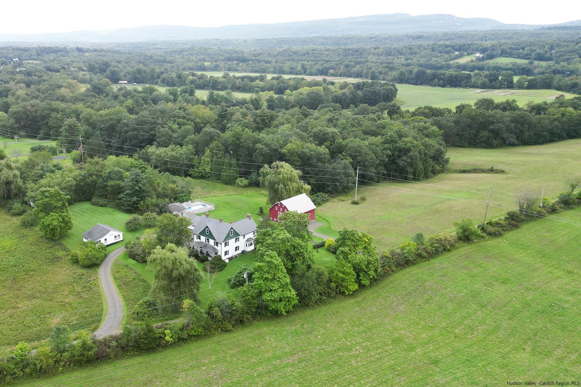 Stunning Farmstead on 100+ Acres