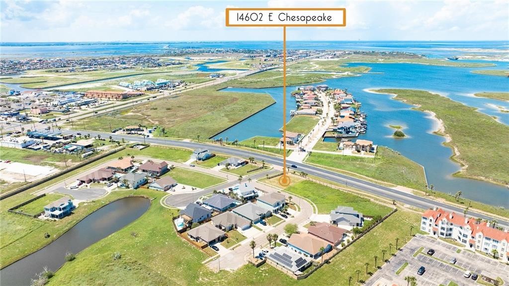 Aerial view of 14602 E Chesapeake beside coastal waterways and wetlands.