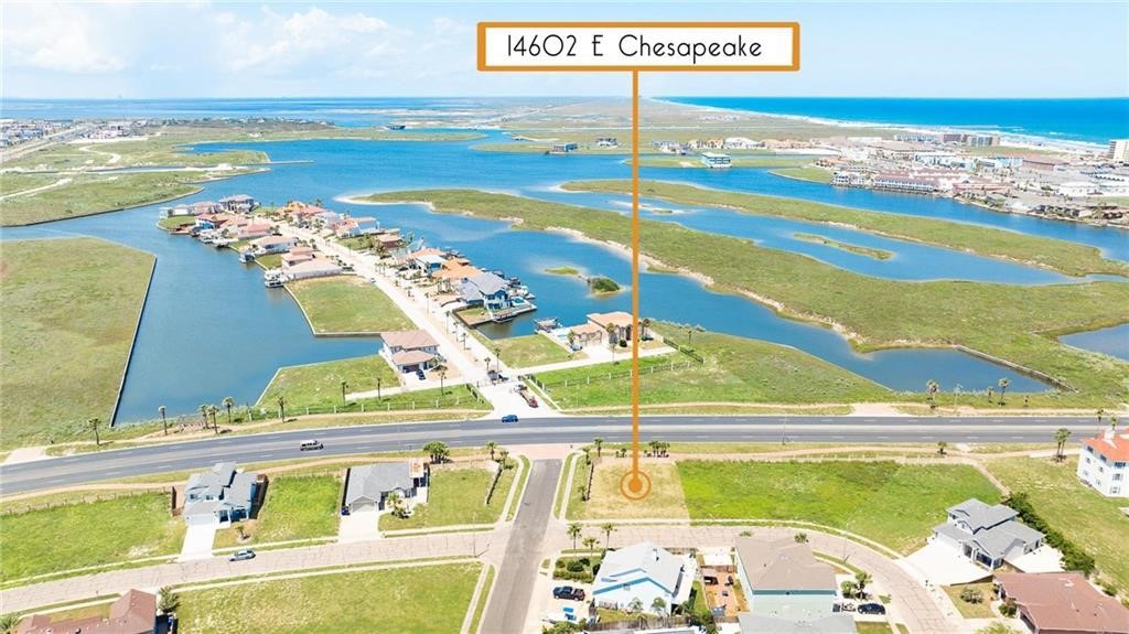 Vacant lot at 14602 E Chesapeake beside a road, with waterways and the coast nearby.