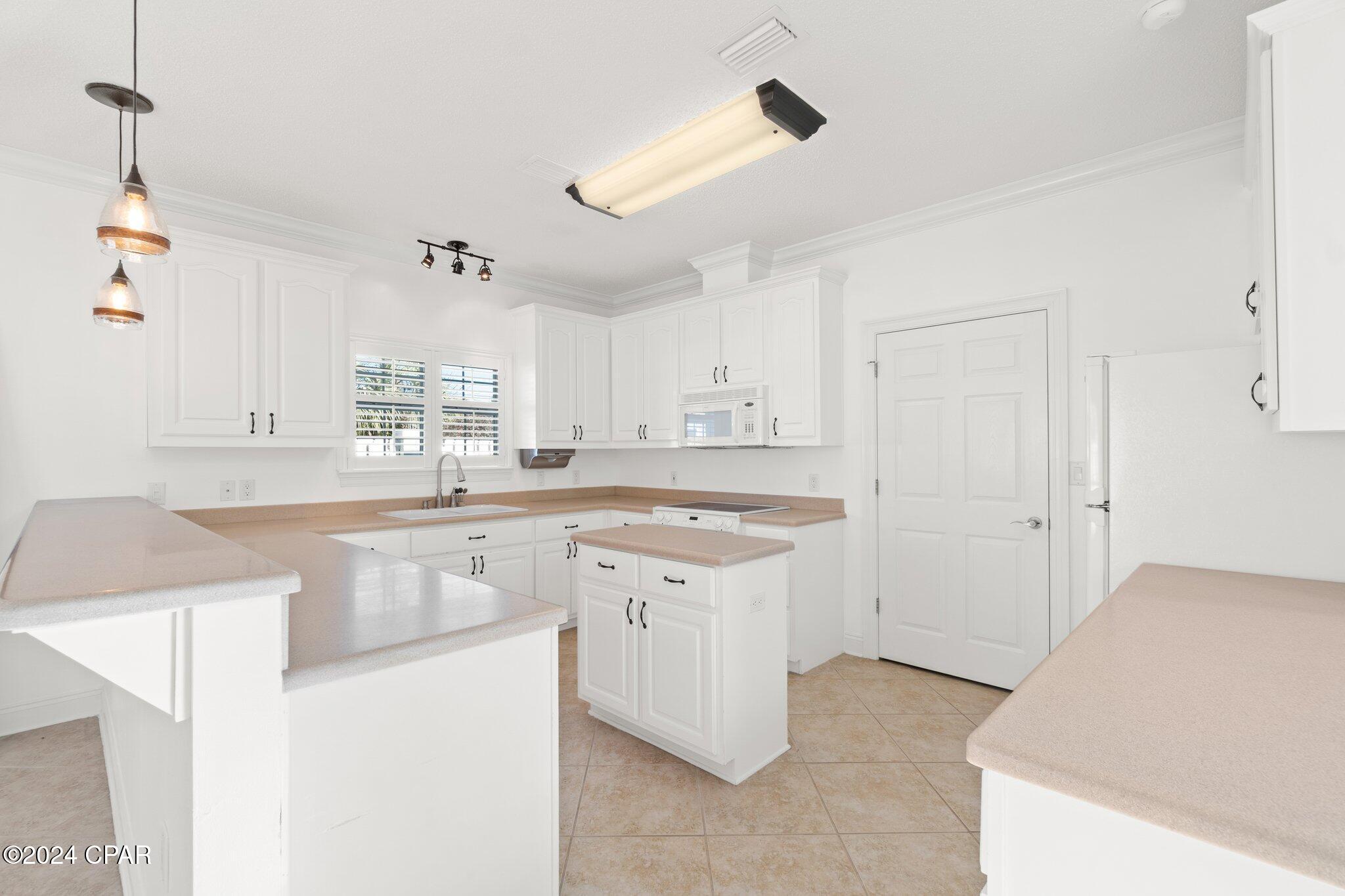7009 N Lagoon Drive 102