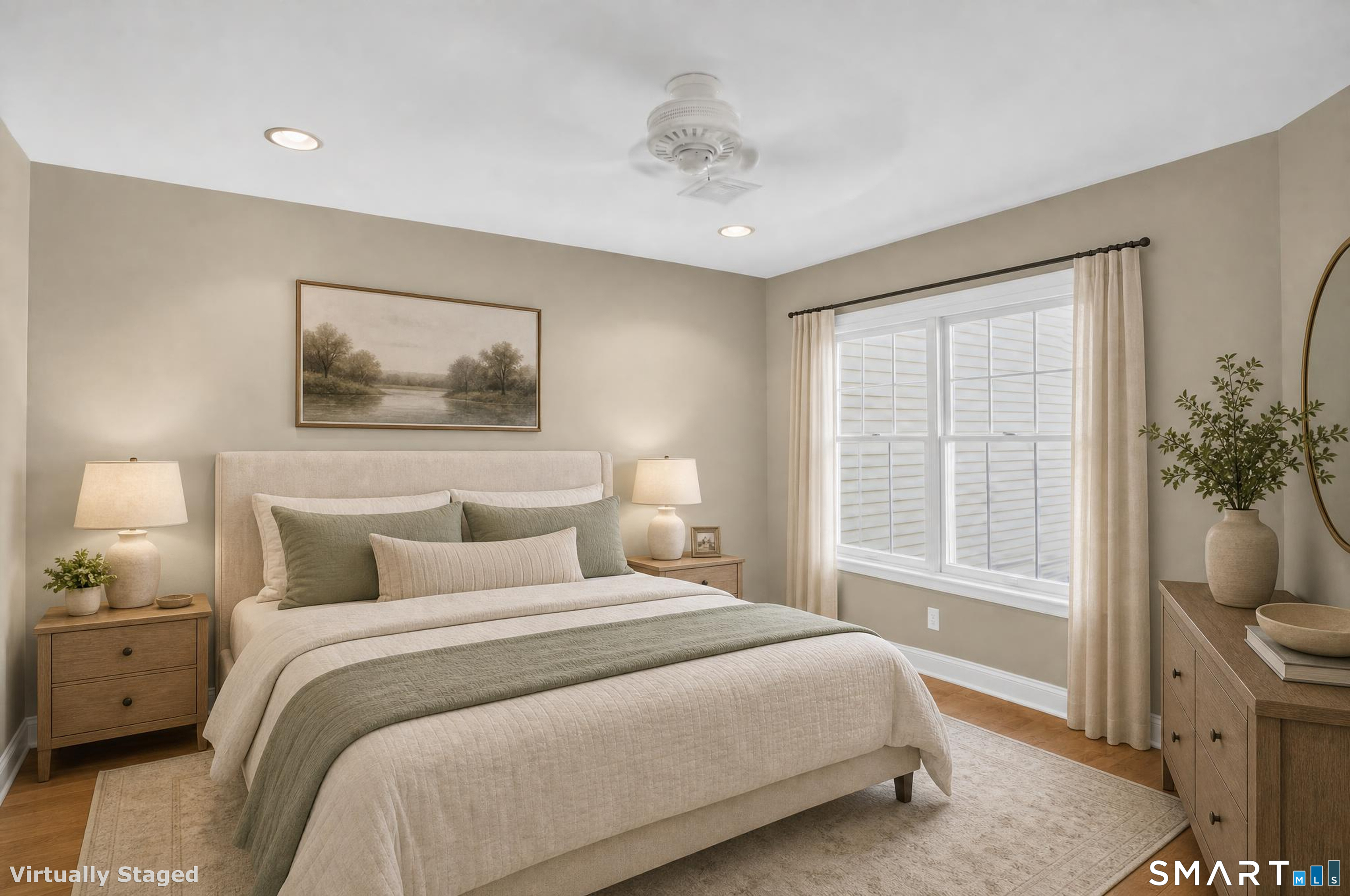 Virtually staged bedroom with a cream bed, sage accents, and a large curtained window.