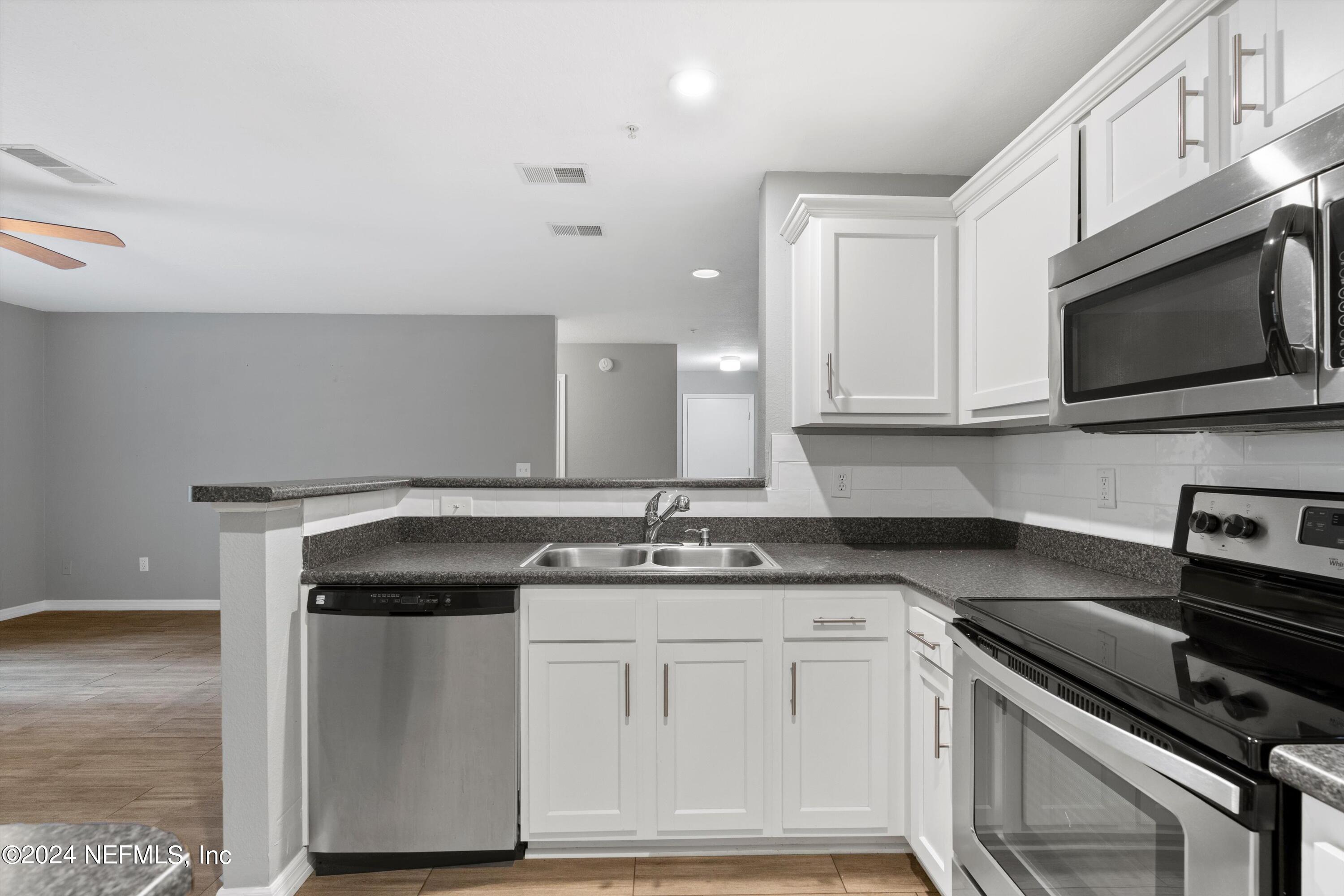 7701 TIMBERLIN PARK Boulevard, 218