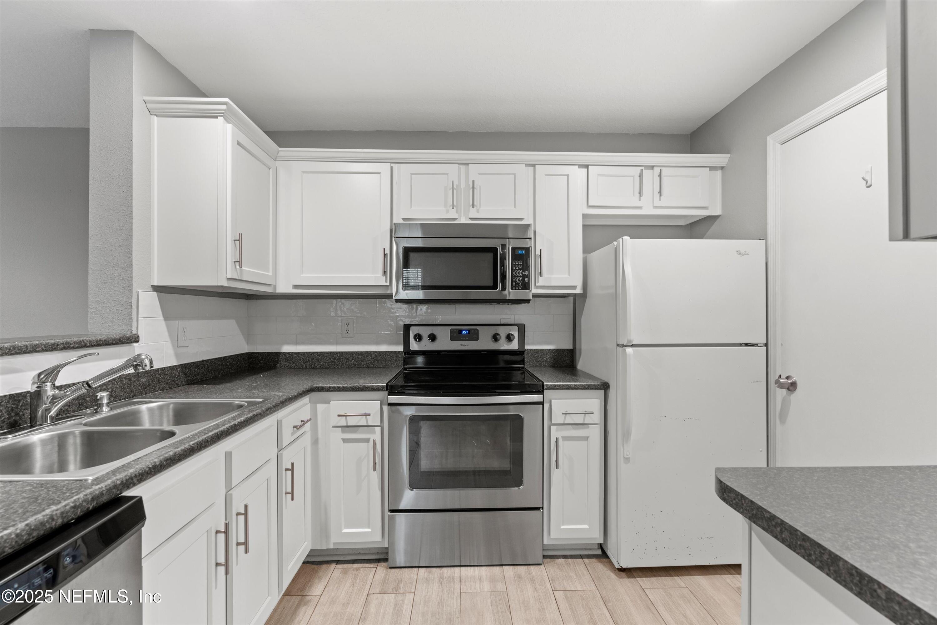 7701 TIMBERLIN PARK Boulevard, 218