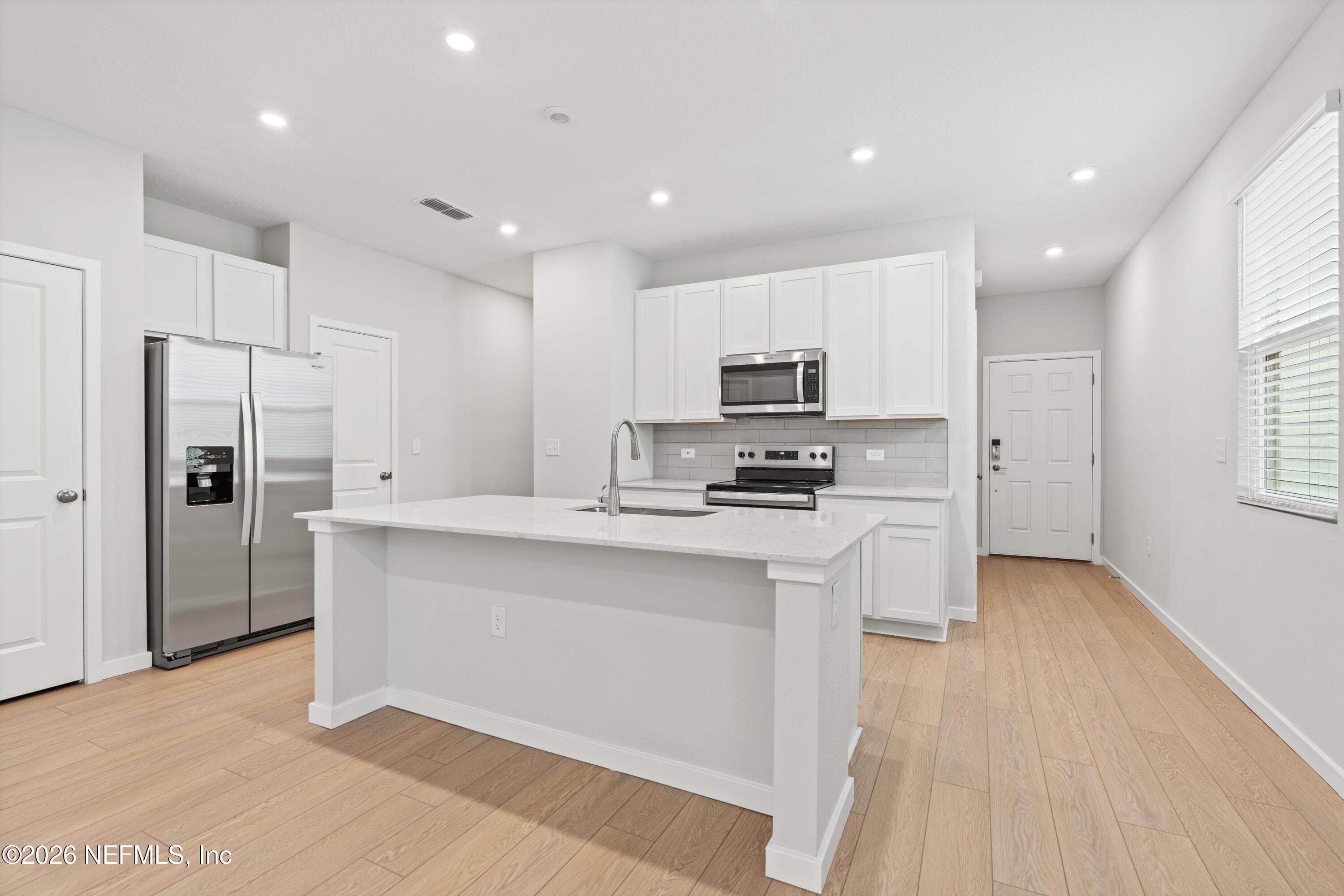 14728 MACADAMIA Lane