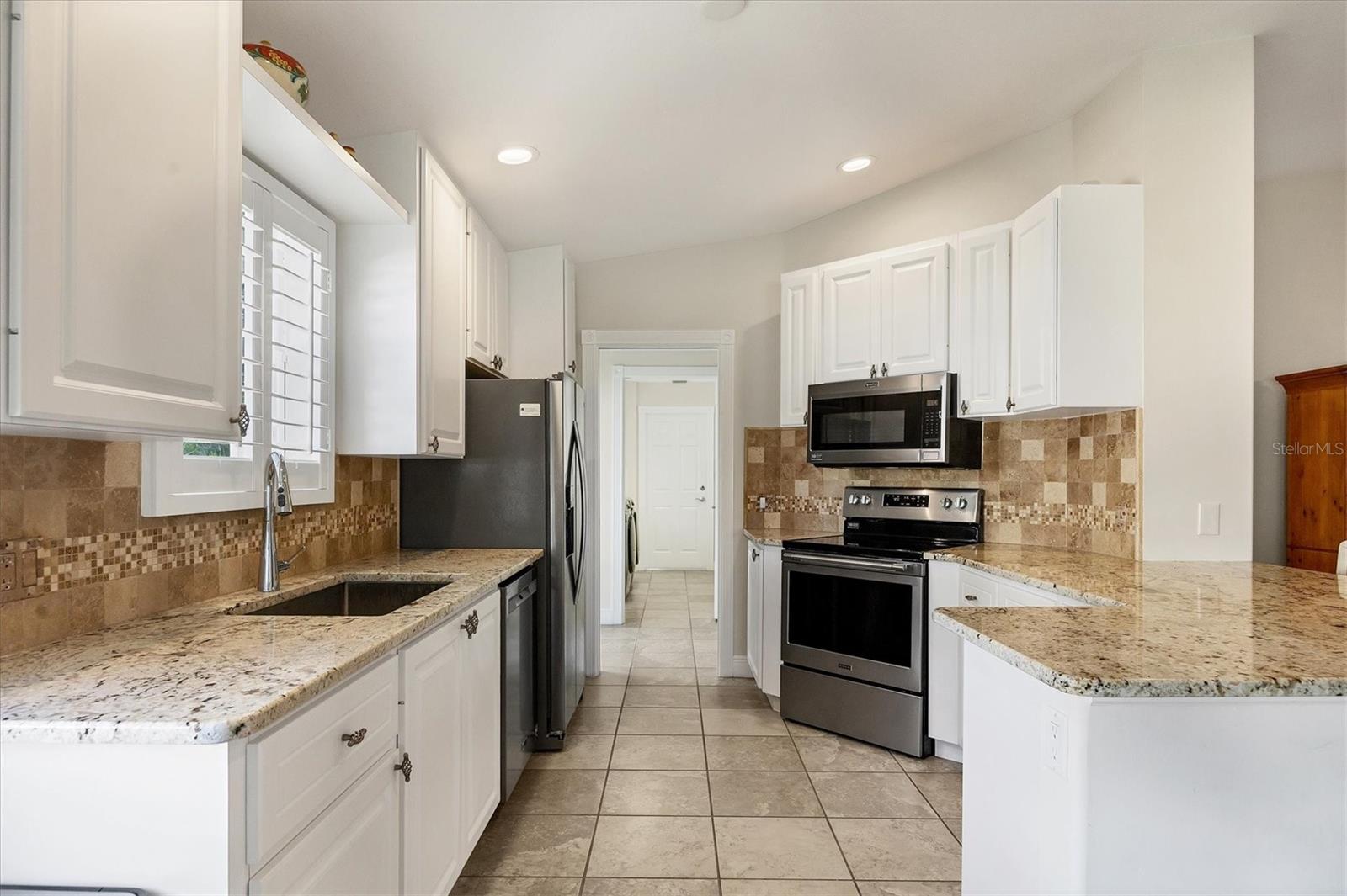 7708 CAMMINARE DR