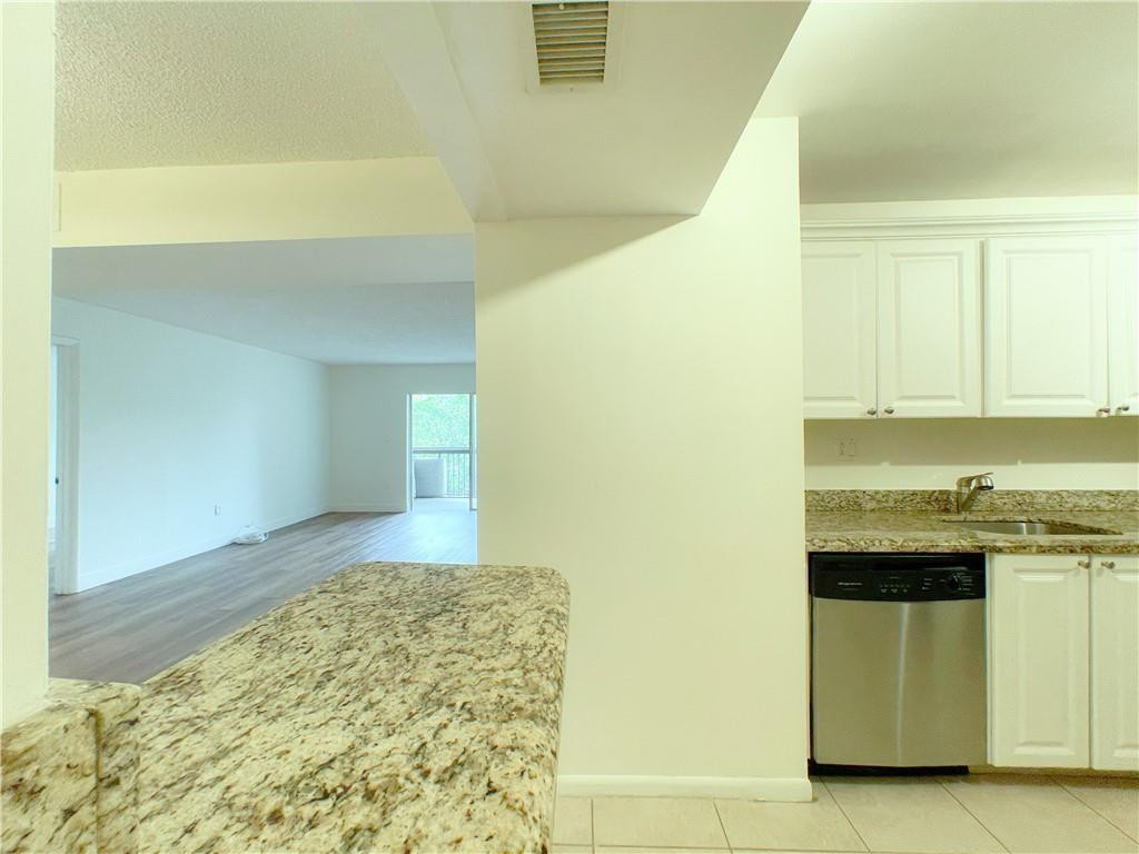 711 N Pine Island Rd 302