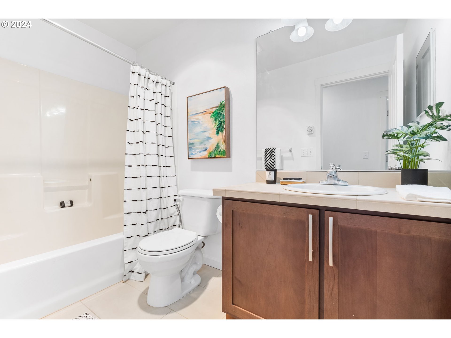 665 NW FALLING WATERS LN 101