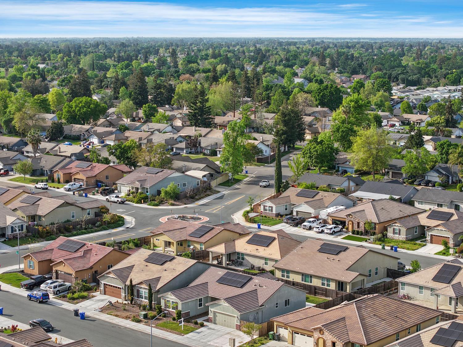Aerial view of a Galt neighborhood with tree-lined streets and rows of homes.