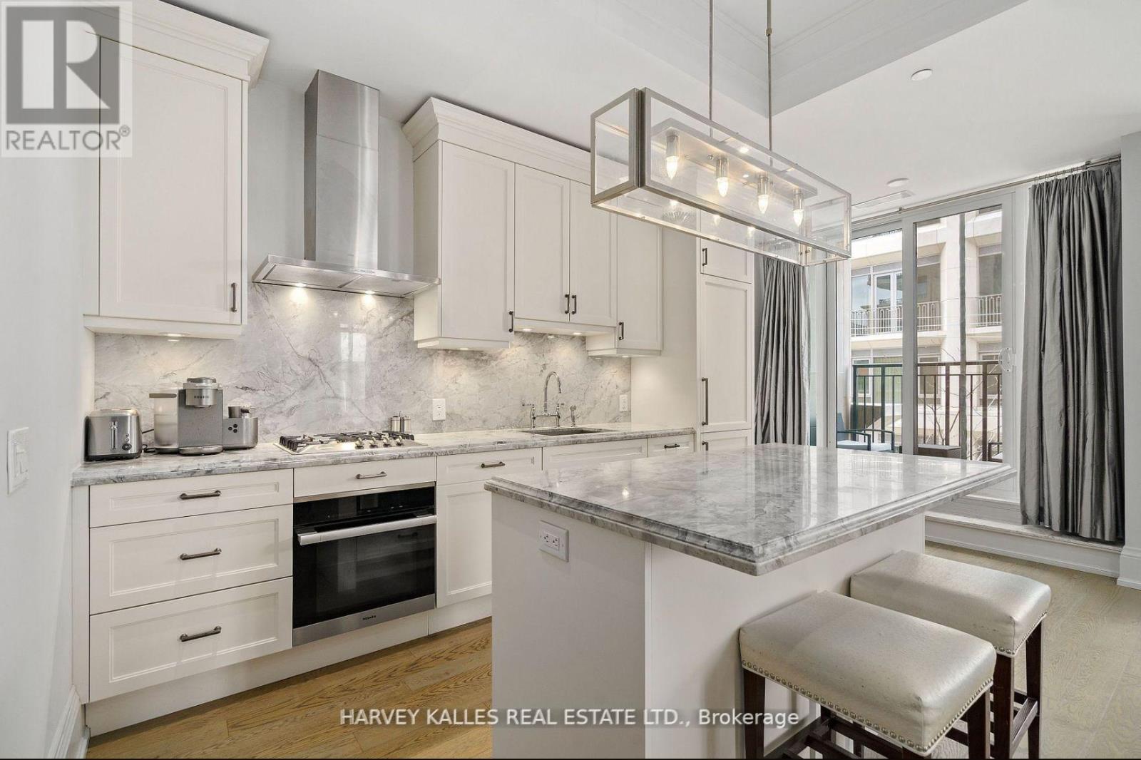 306 - 133 HAZELTON AVENUE