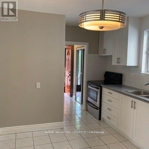 MAIN - 72 MCGILLIVRAY AVENUE