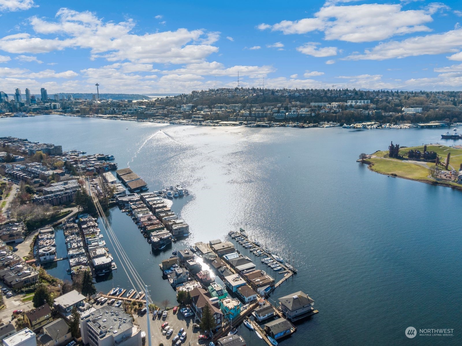 Aerial view of Lake Union, with houseboats, Seattle’s skyline and the Space Needle.