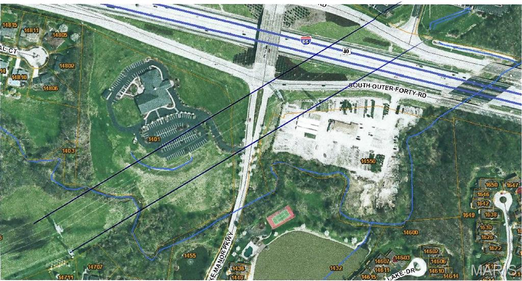 Aerial view of the 14550 property beside South Outer Forty Road and Interstate 64, with parcel lines overlaid.