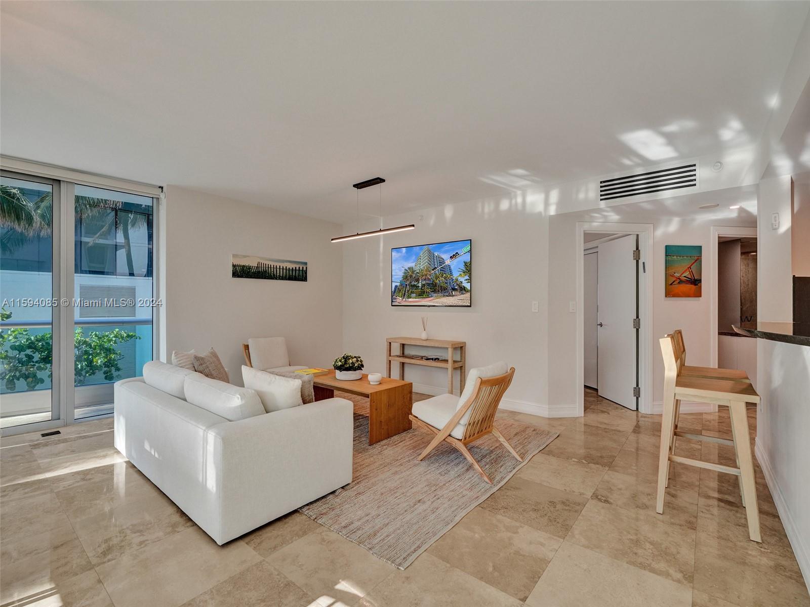 9401 Collins Ave # 203
