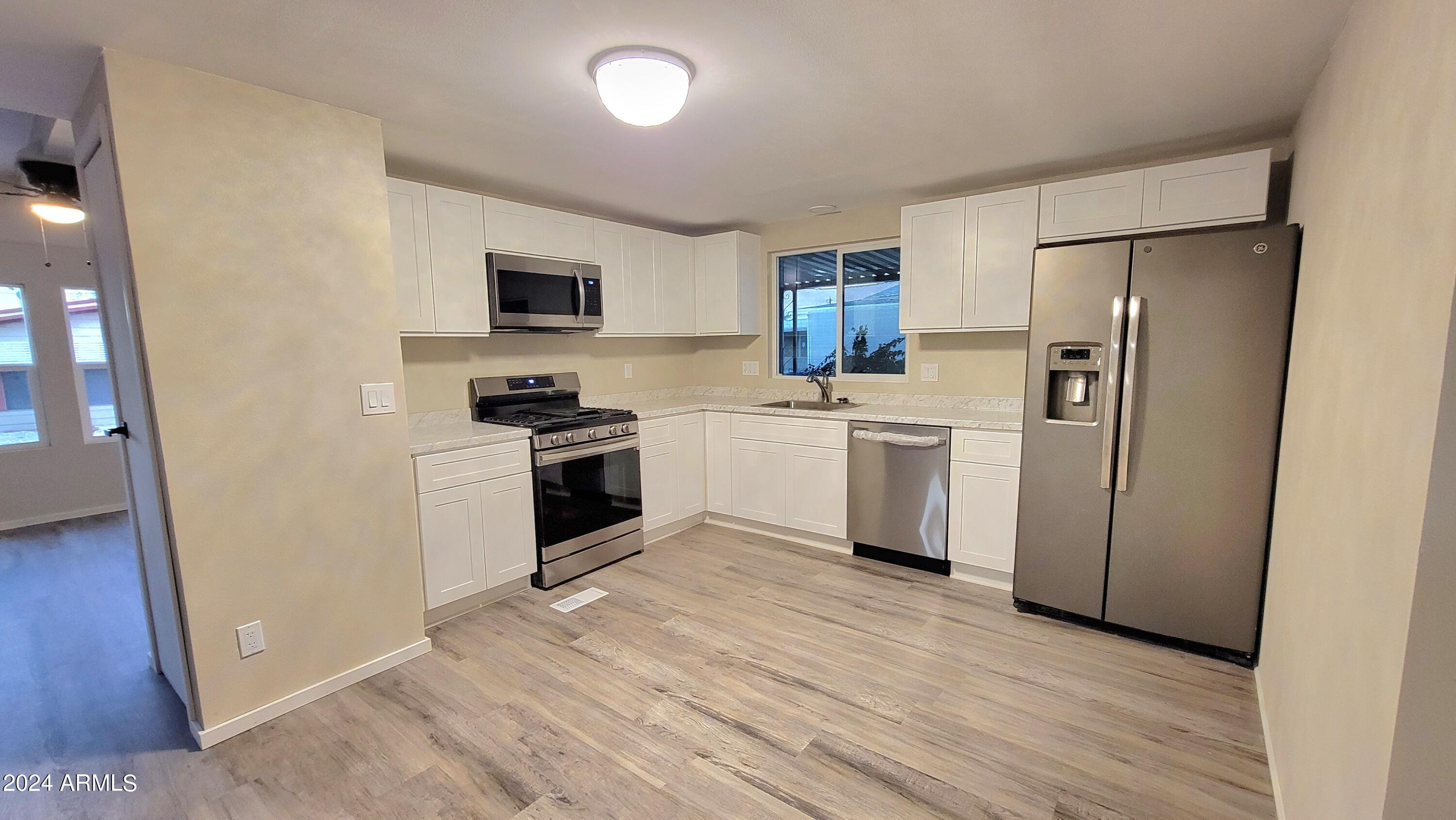11000 N 91ST Avenue, 54