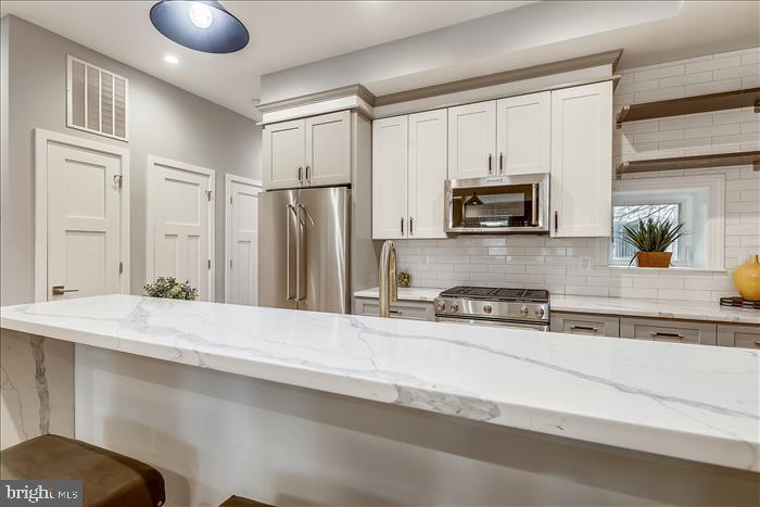1410 NEWTON STREET NW Unit: 1
