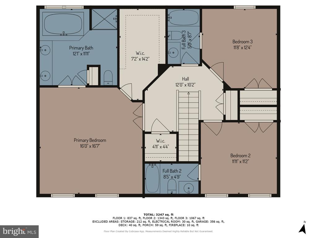 Second-floor plan showing a primary suite, two bedrooms, bathrooms, walk-in closets, and central stairs.