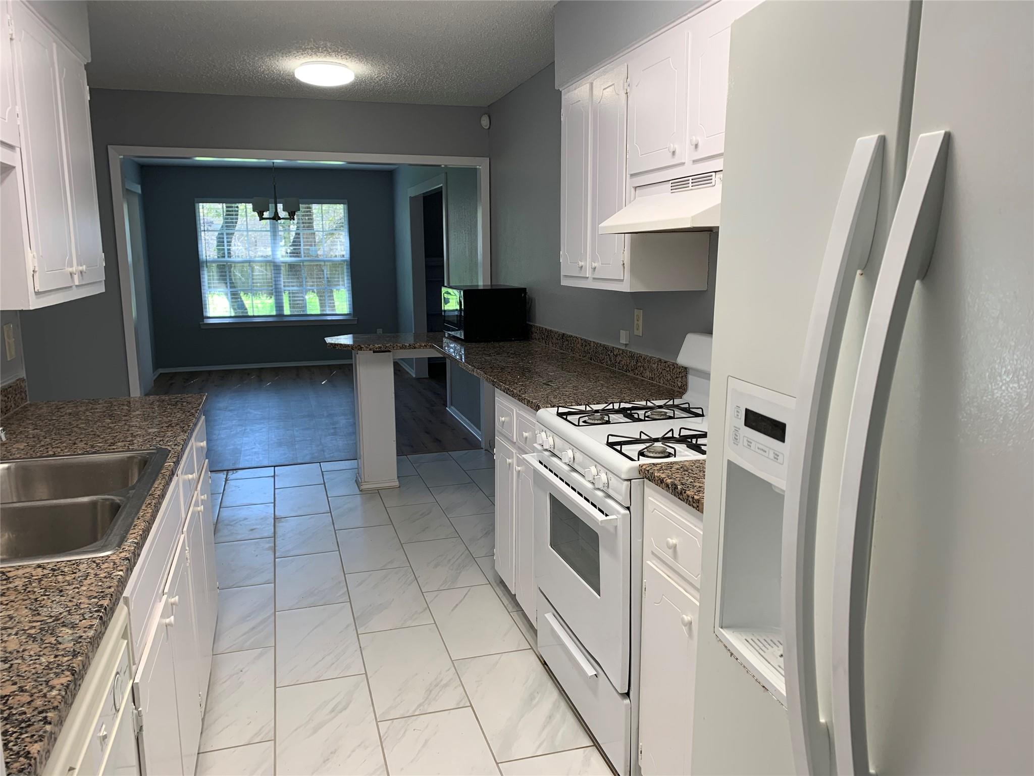 10015 NW Woodland Village DR