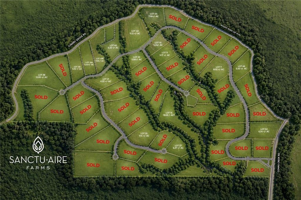 Sanctuaire Farms subdivision map with wooded lots, roads, and parcels marked sold.