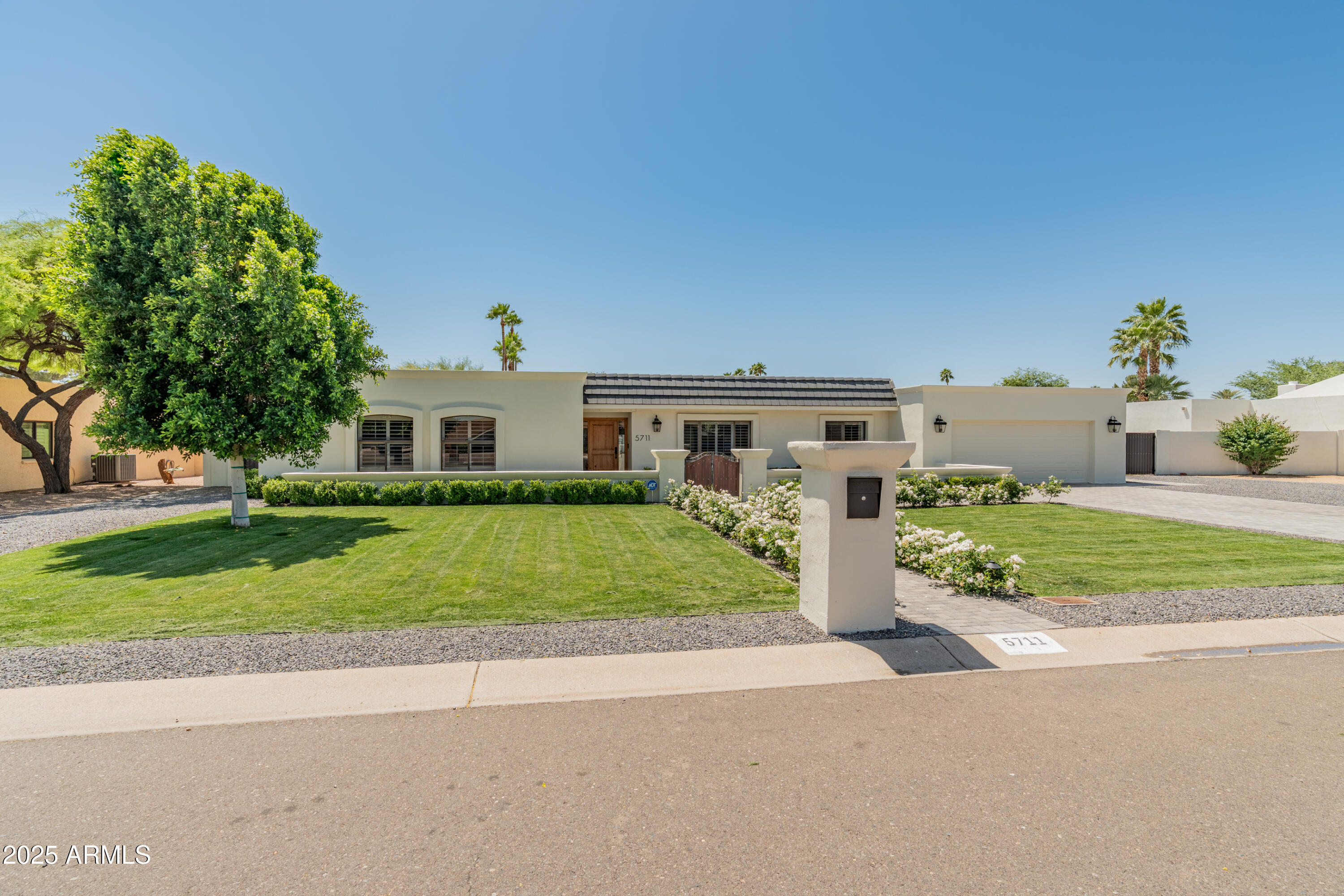 5711 E CORRINE Drive