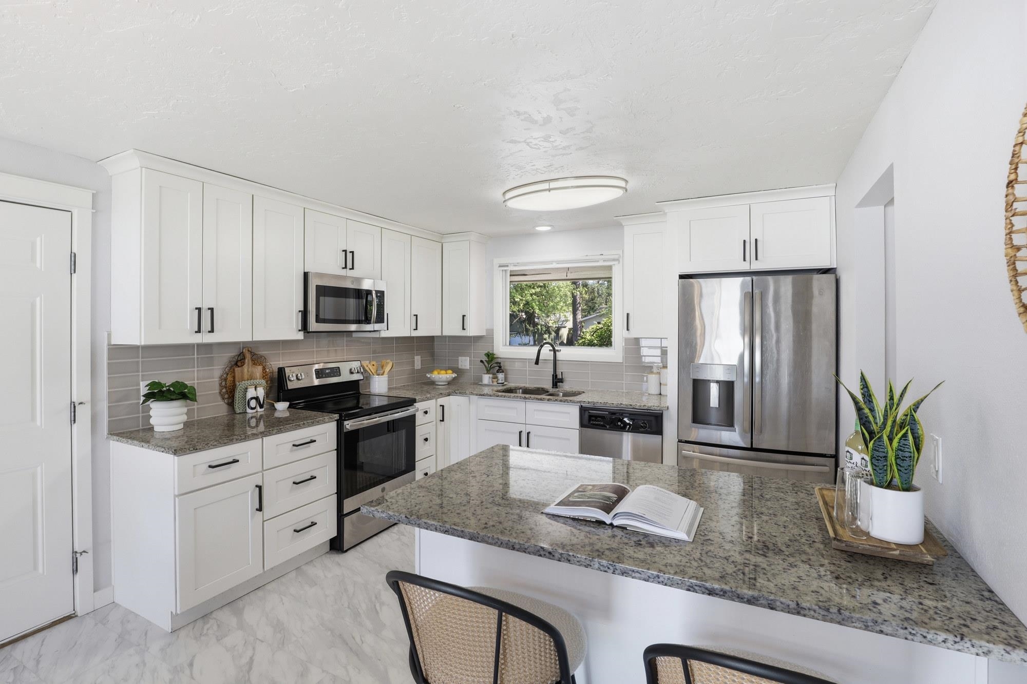 5 E Regina Ave