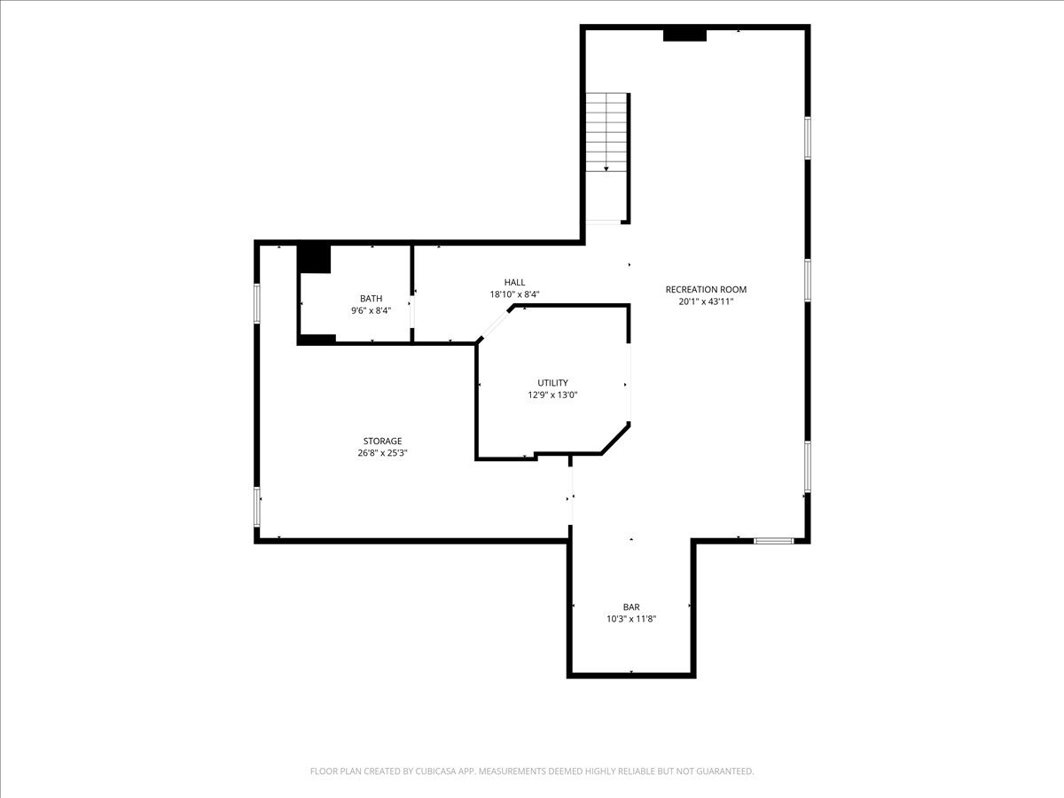 Lower-level floor plan with a large recreation room, bath, utility room, storage area, and bar.