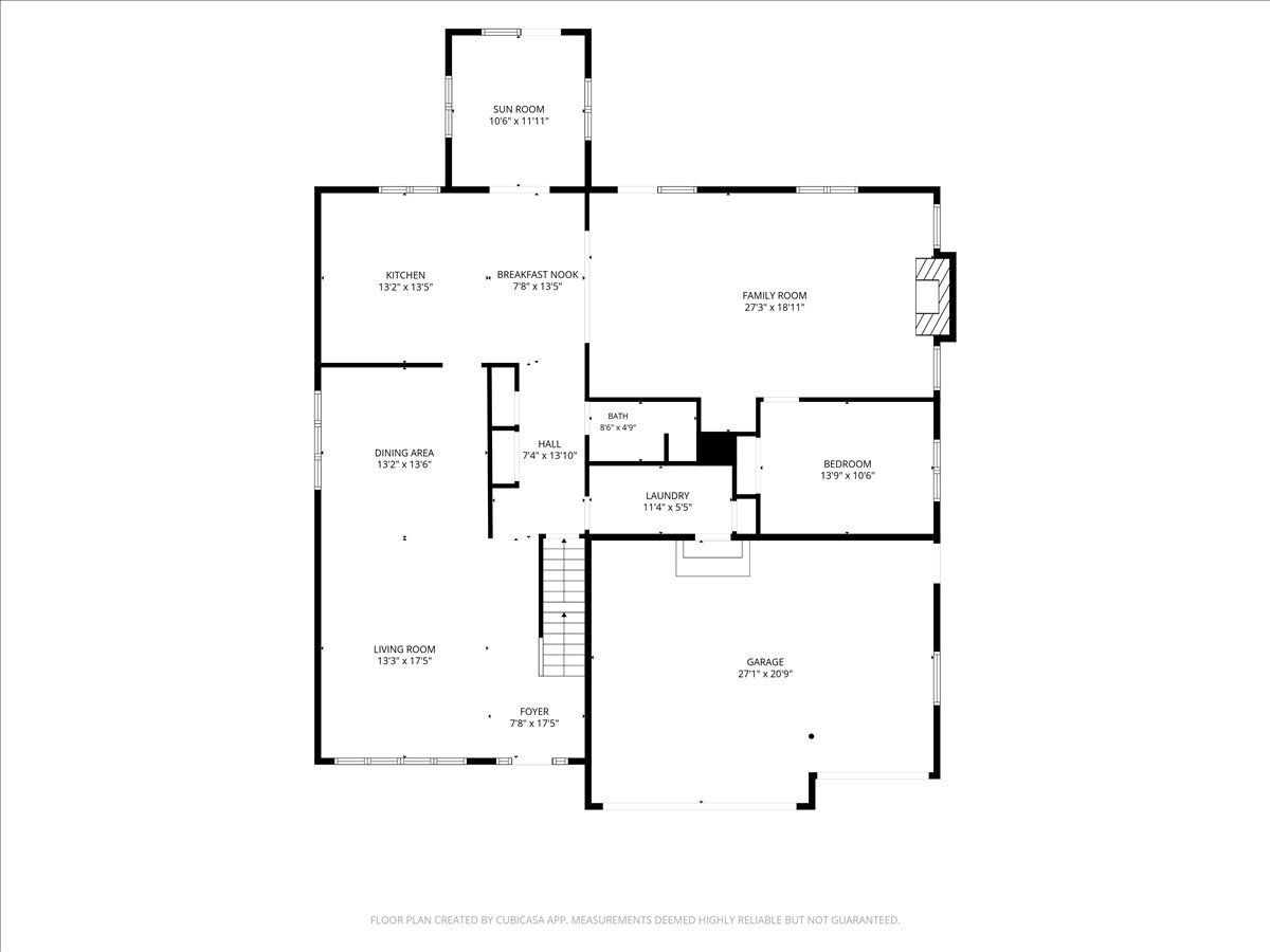 Floor plan showing the home’s room layout, including a sun room, family room, bedroom, and garage.