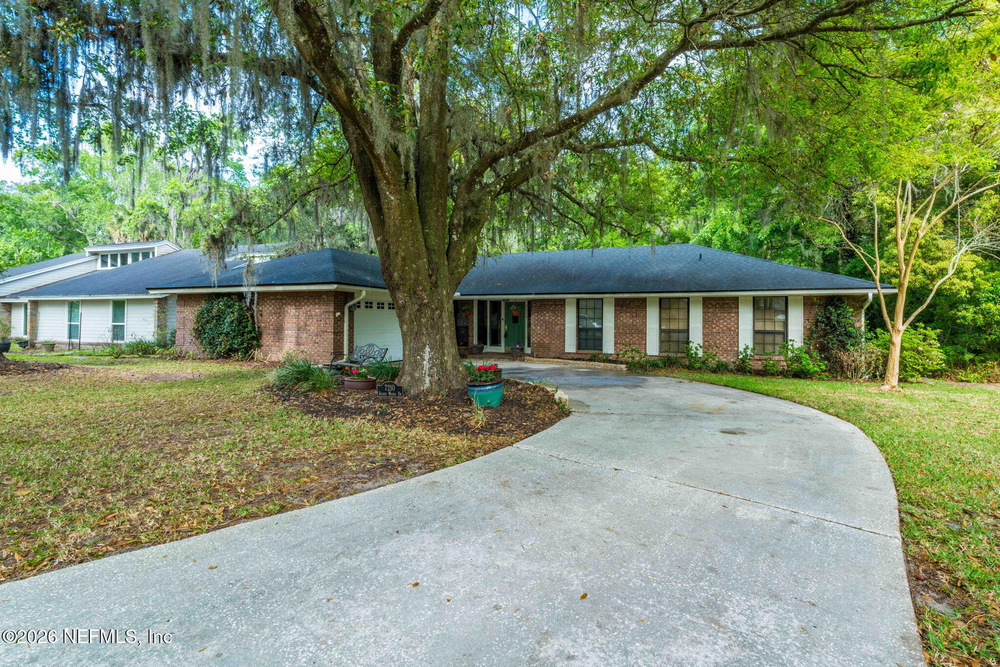 7210 SECRET WOODS Drive