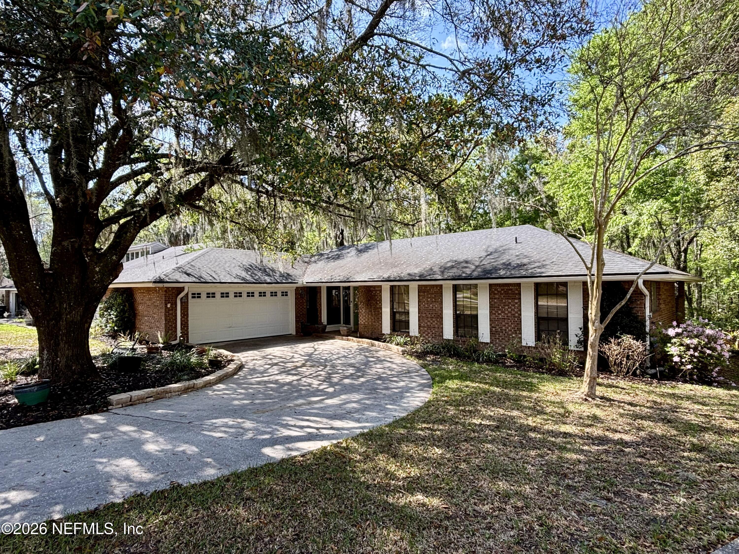 7210 SECRET WOODS Drive