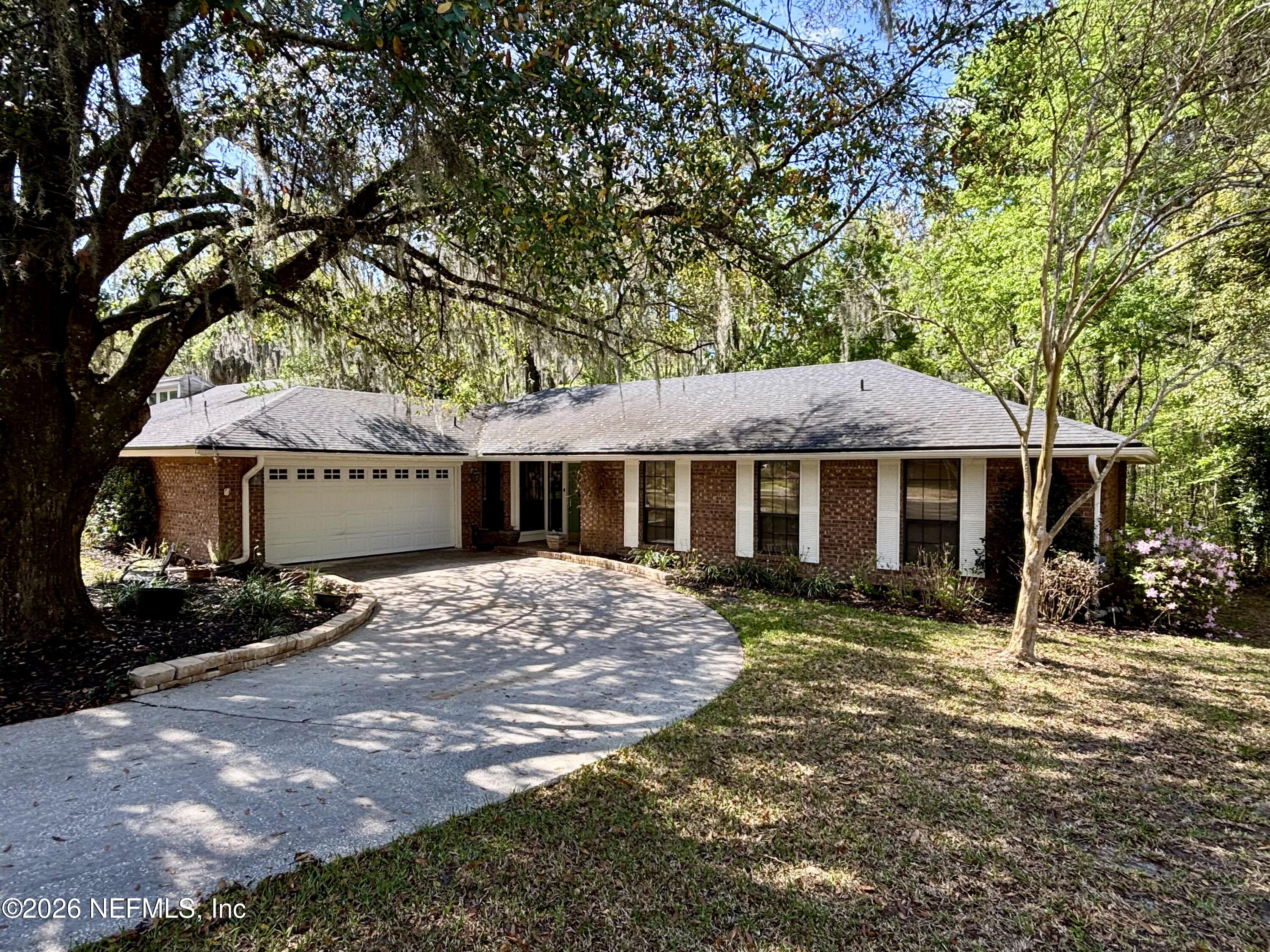 7210 SECRET WOODS Drive