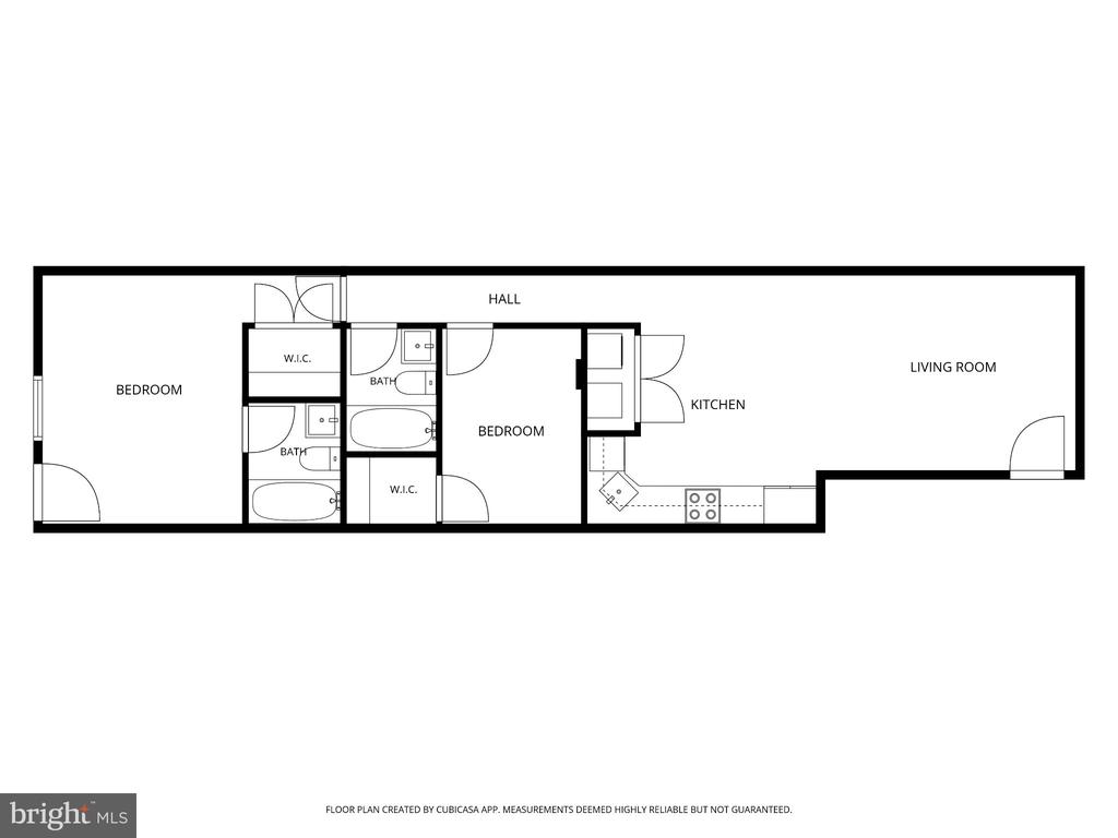 Floor plan showing two bedrooms, two bathrooms, two walk-in closets, a kitchen, and a living room.