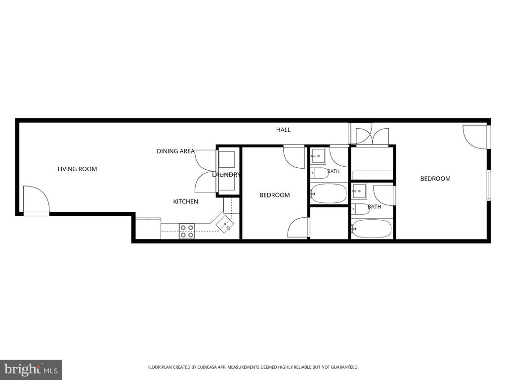 Floor plan showing two bedrooms, two bathrooms, a living room, dining area, kitchen, and laundry area.