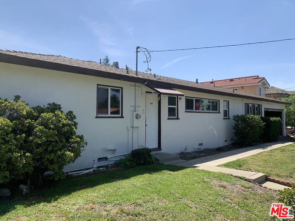 9802 E Camino Real Avenue