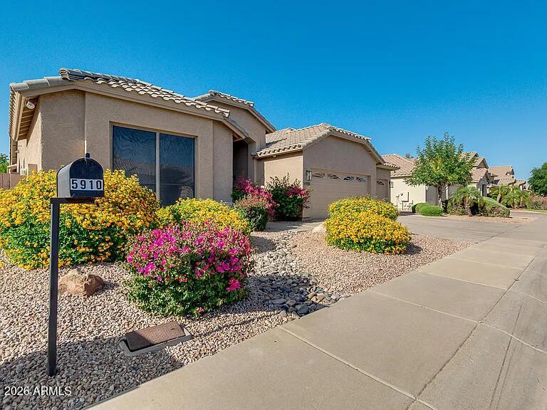 5910 E WOODRIDGE Drive