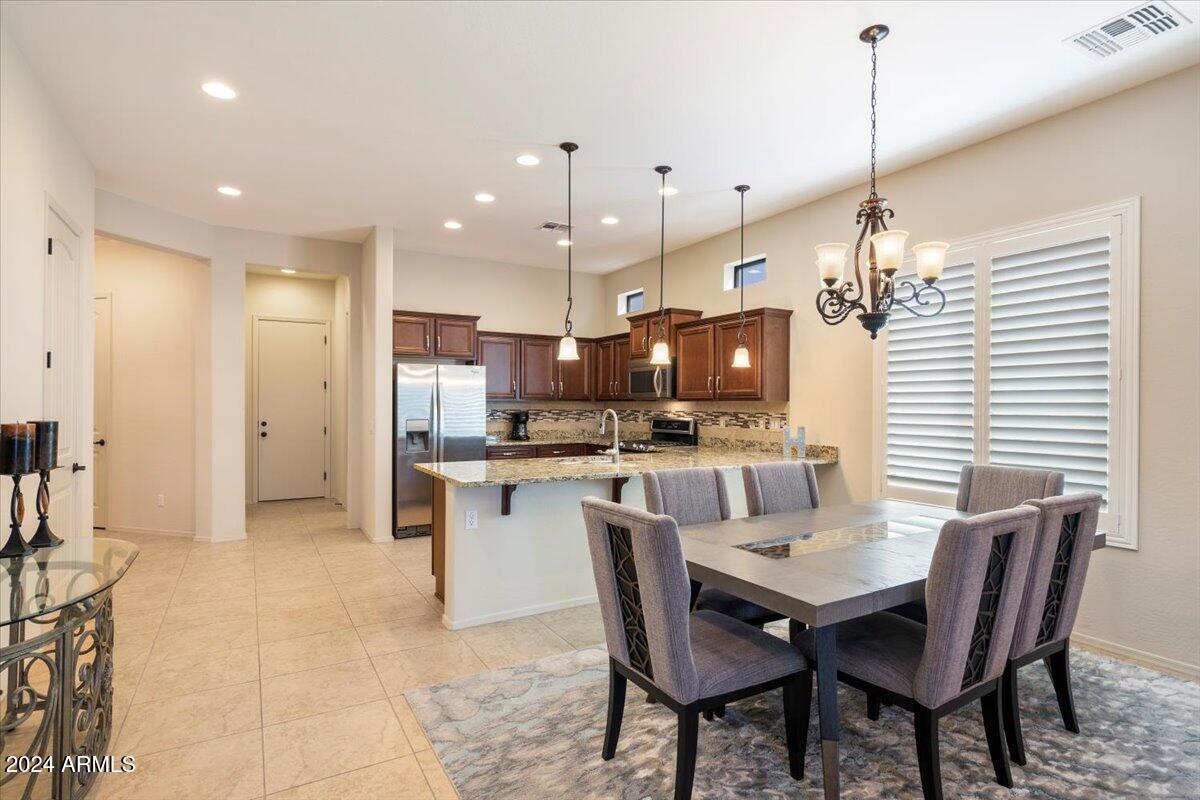 9033 E IVYGLEN Circle