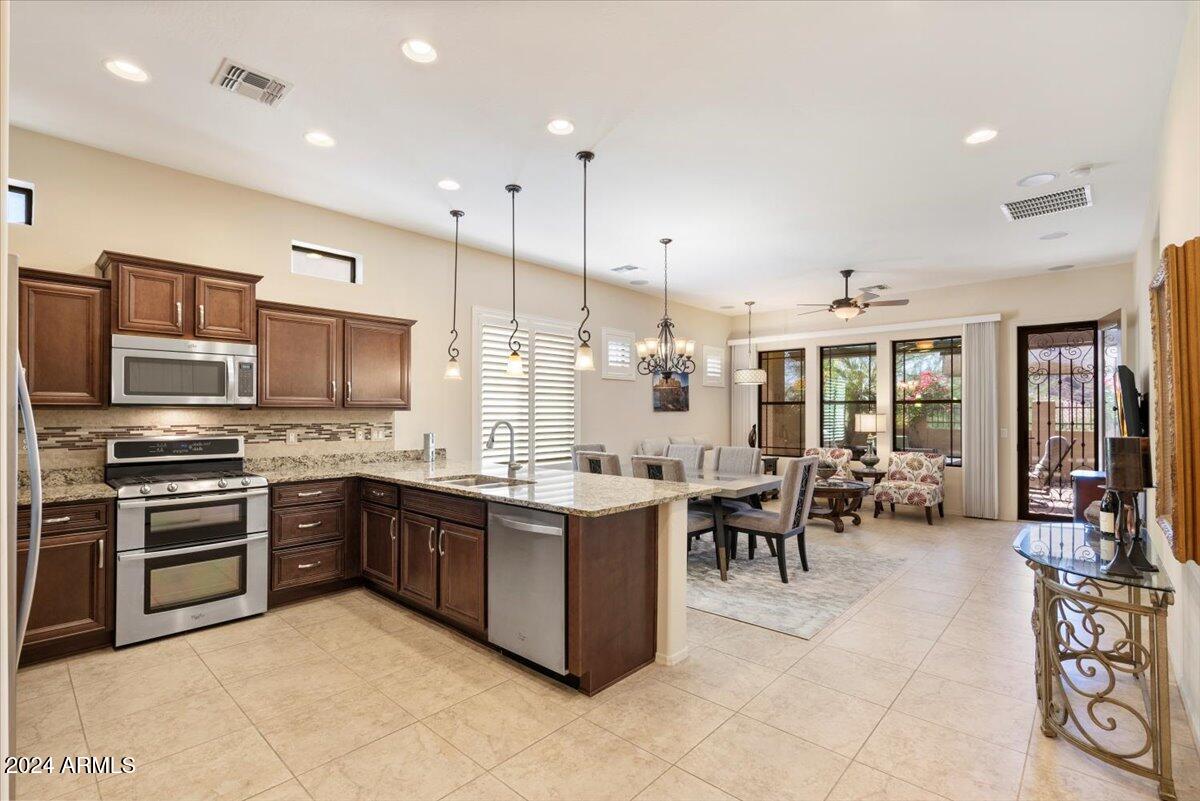 9033 E IVYGLEN Circle