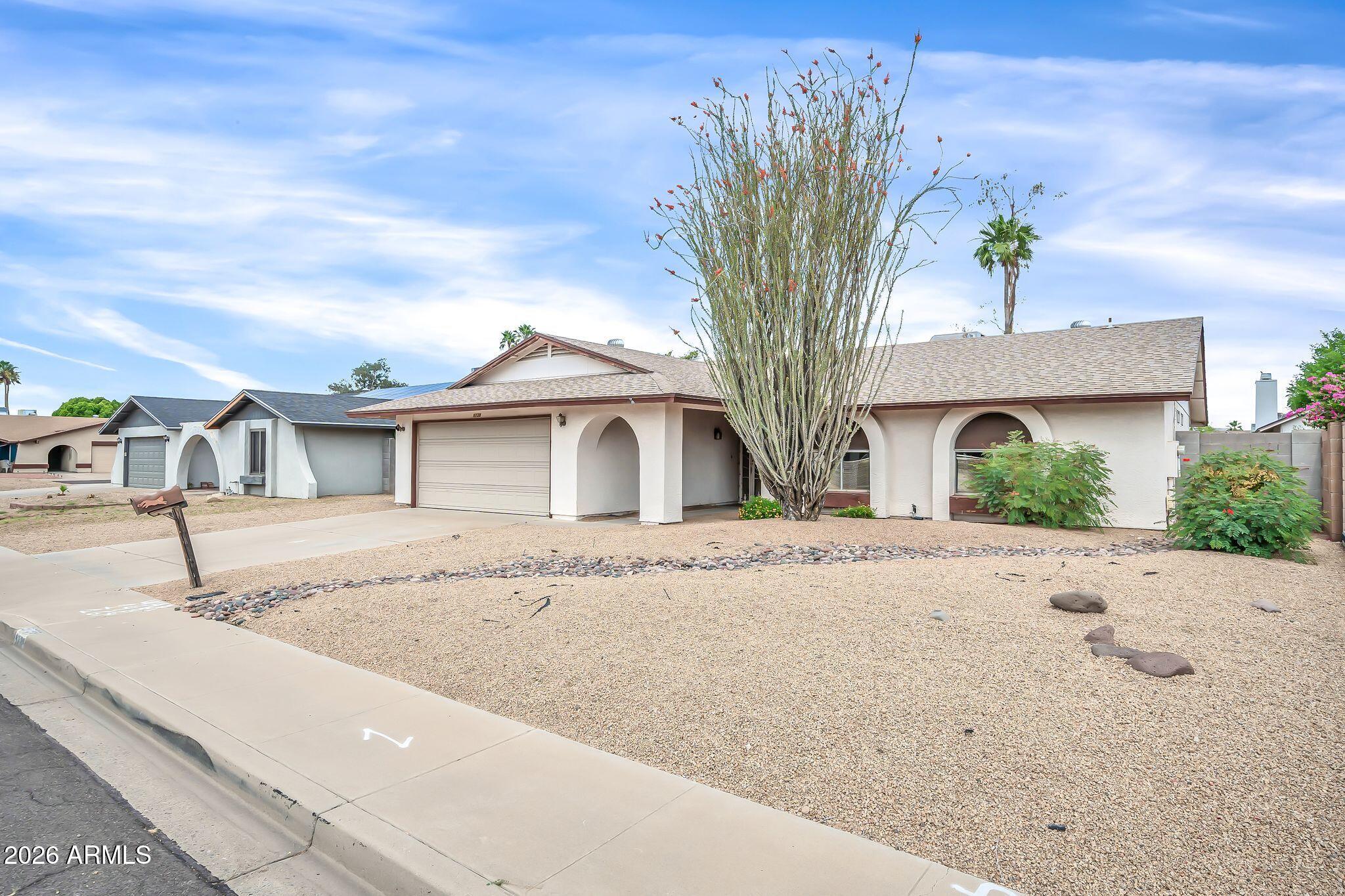 5738 W GREENBRIAR Drive