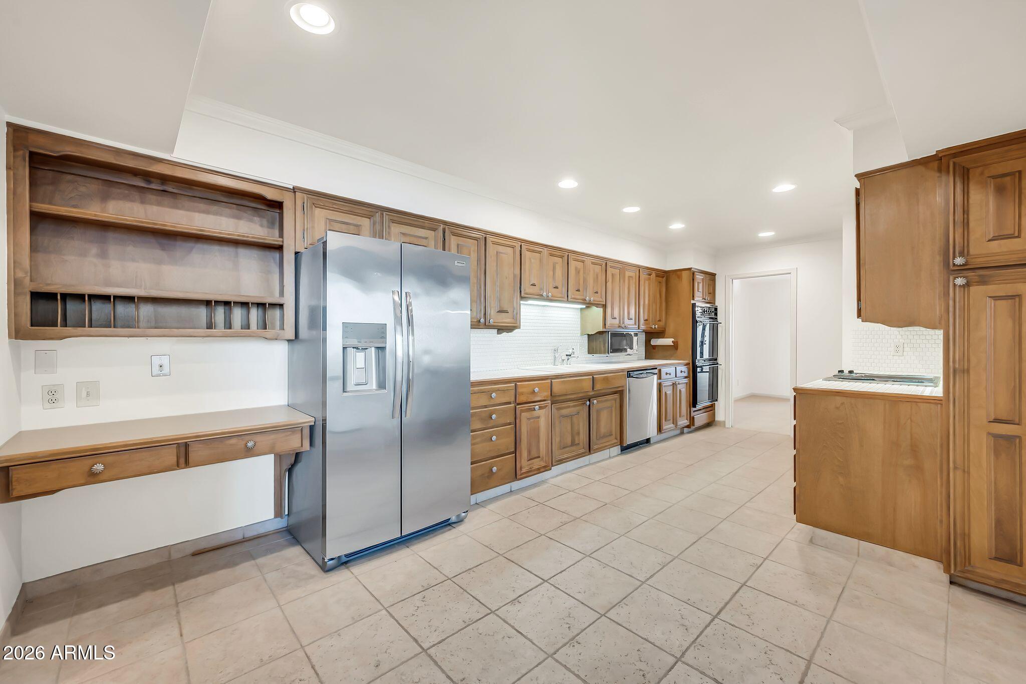 77 E MISSOURI Avenue 57