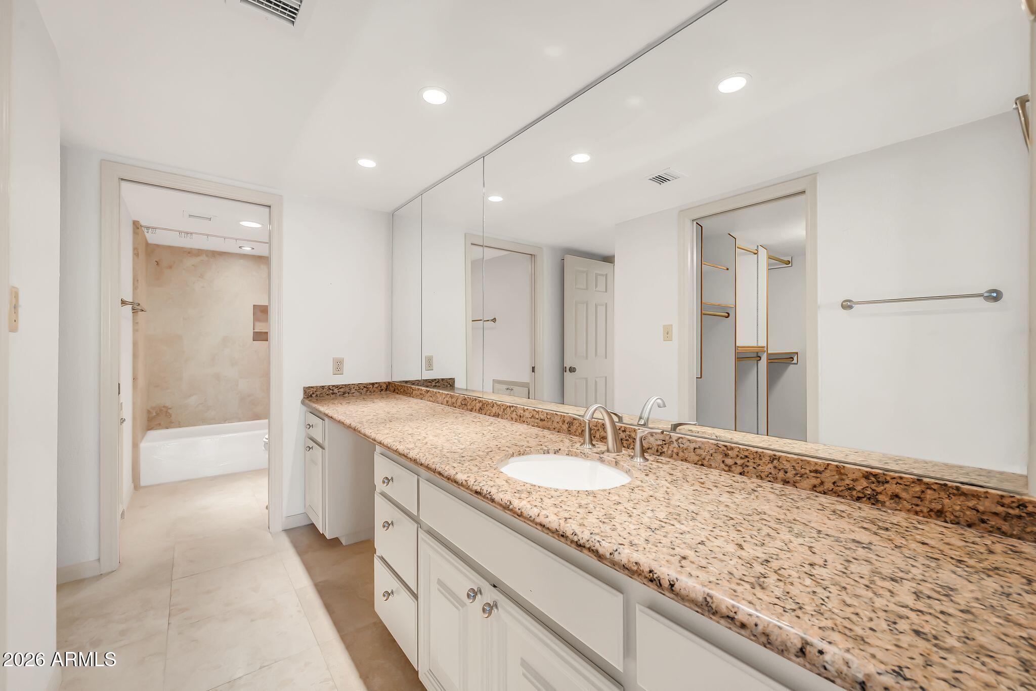 77 E MISSOURI Avenue 57