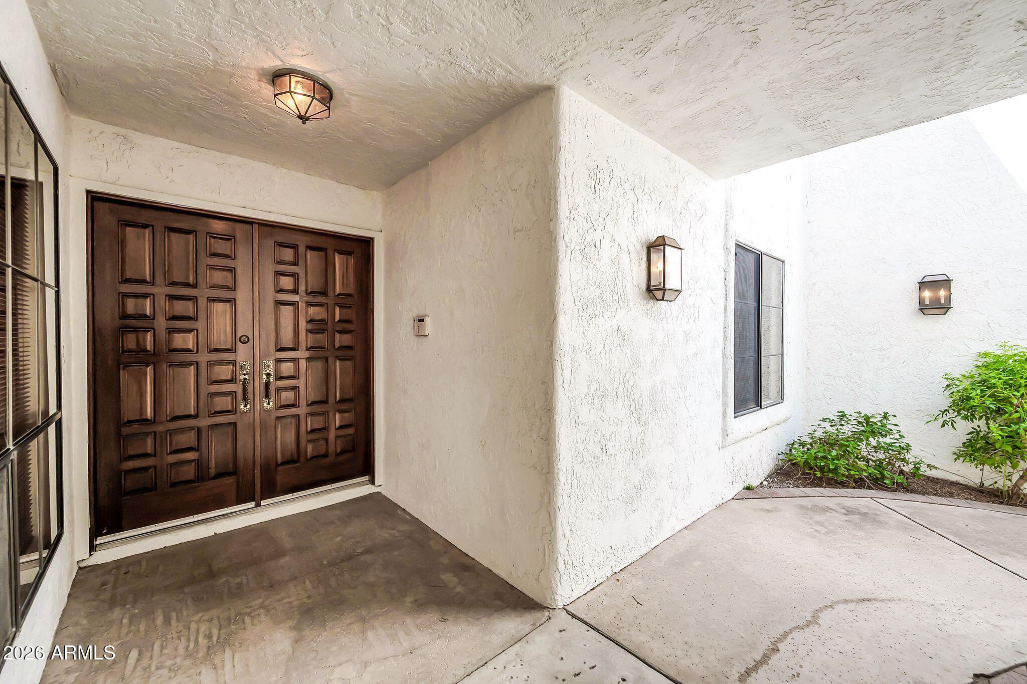 77 E MISSOURI Avenue 57