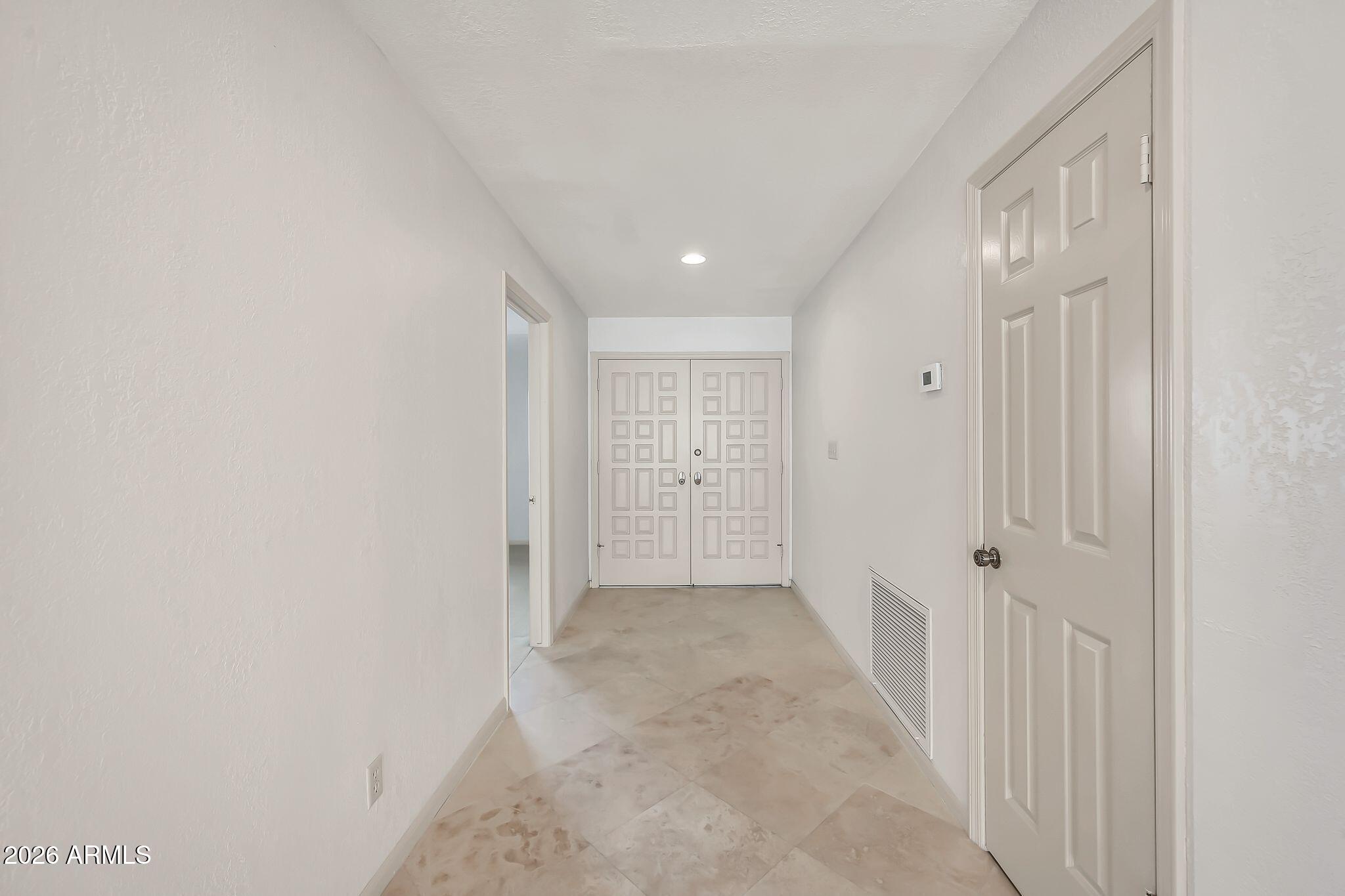 77 E MISSOURI Avenue 57