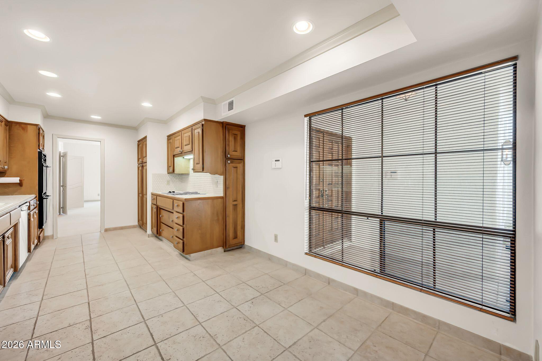 77 E MISSOURI Avenue 57
