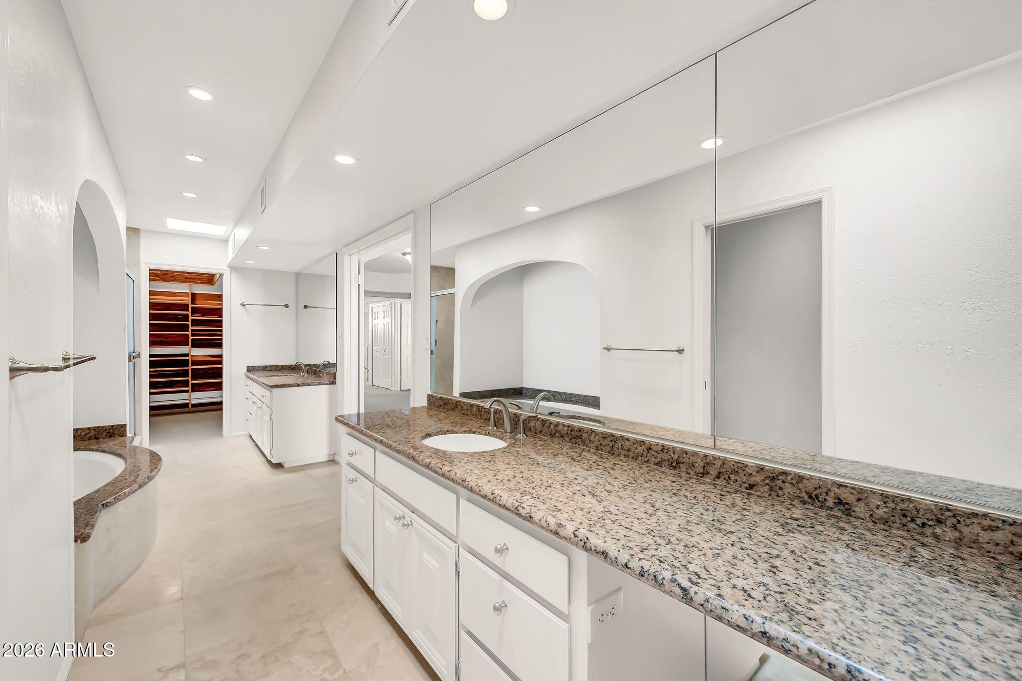 77 E MISSOURI Avenue 57