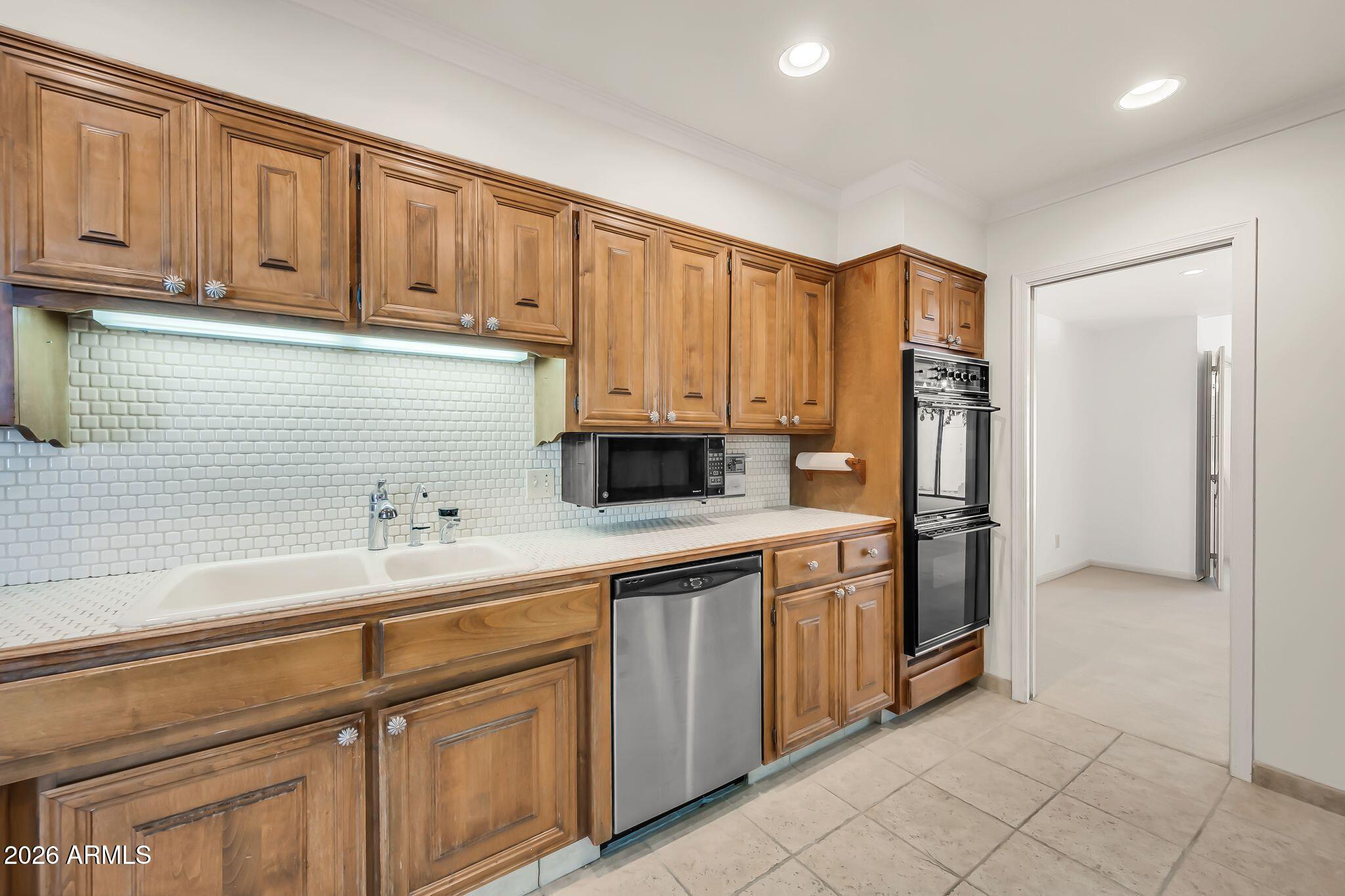 77 E MISSOURI Avenue 57