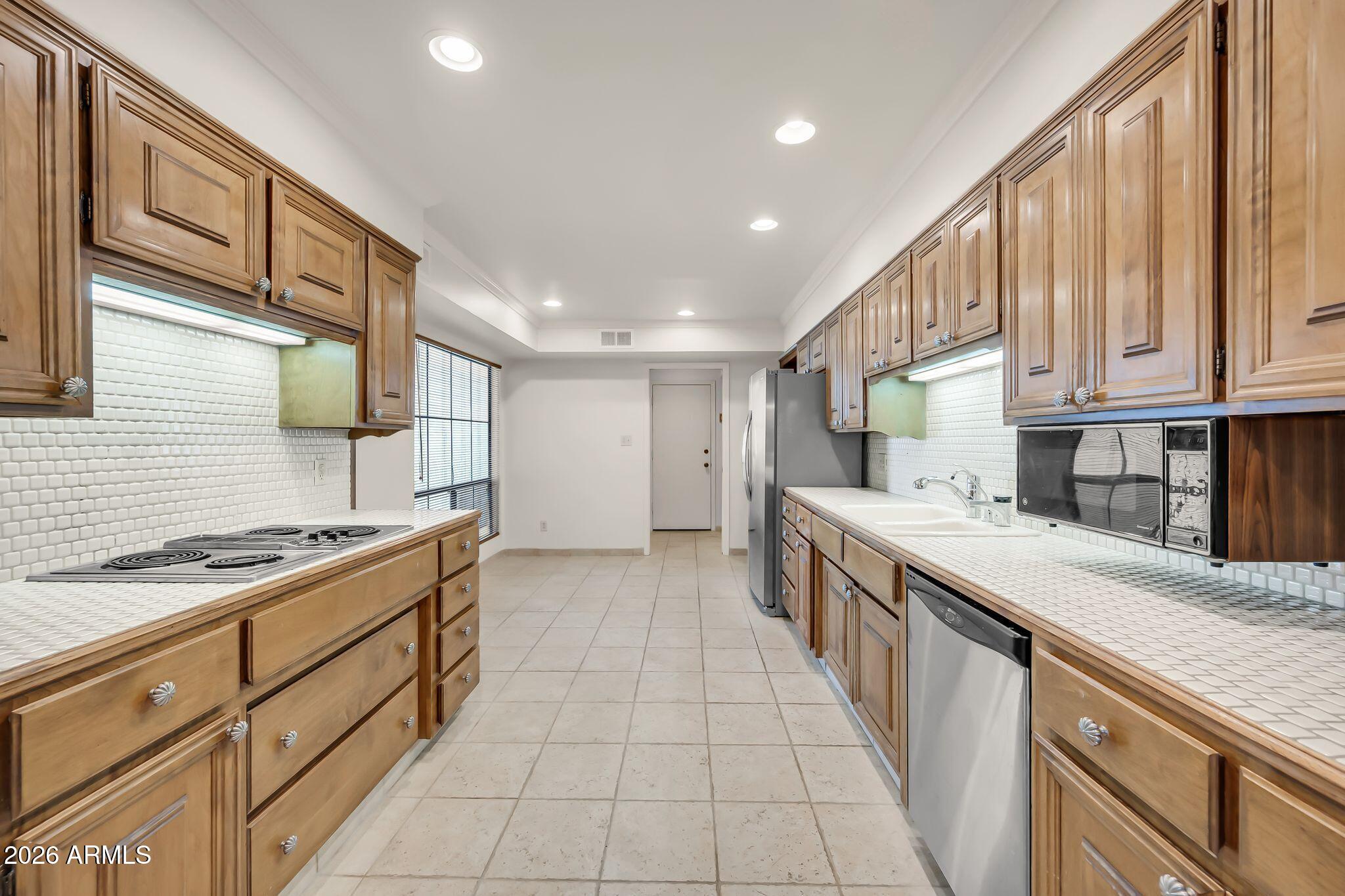 77 E MISSOURI Avenue 57